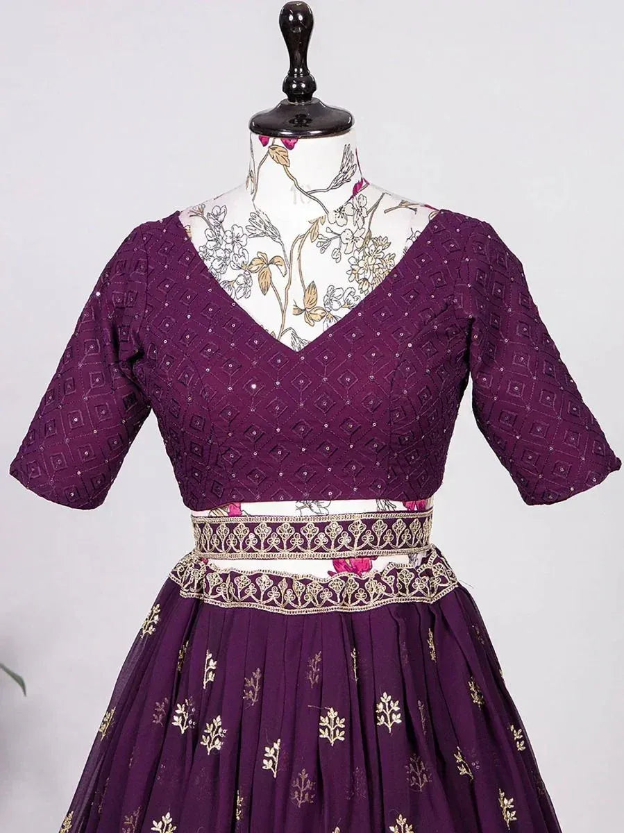 Purple ethnic lehenga choli with gold embroidery and geometric print, perfect for Indian weddings and festive occasions