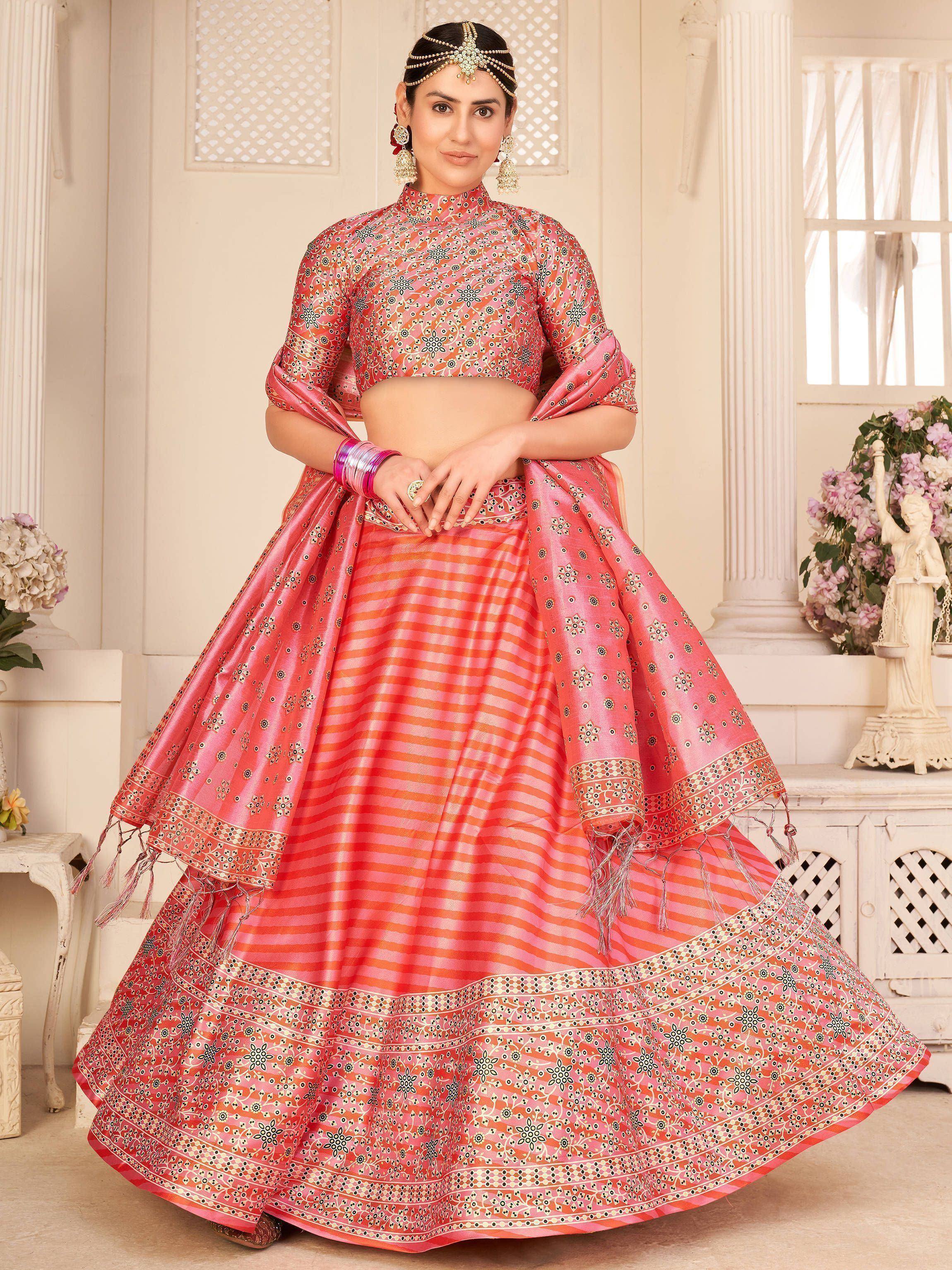 Pink printed lehenga choli with floral motifs, perfect for Indian ethnic wear and festive occasions