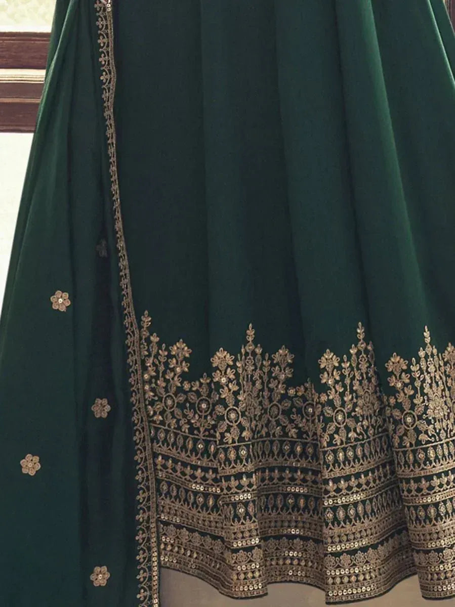 Emerald green lehenga with gold floral embroidery and sequin border, ethnic Indian wear