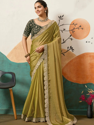 Graceful Yellow Silk Wedding Wear Saree With Heavy Embroidered Blouse