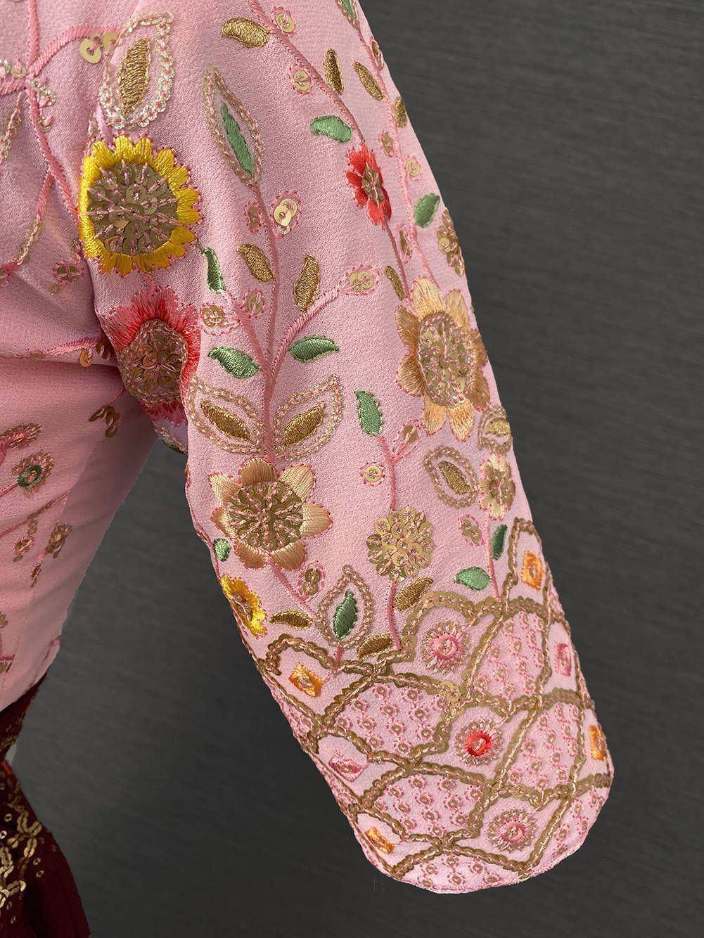 Pink ethnic blouse sleeve with floral embroidery and gold detailing for designer lehenga choli