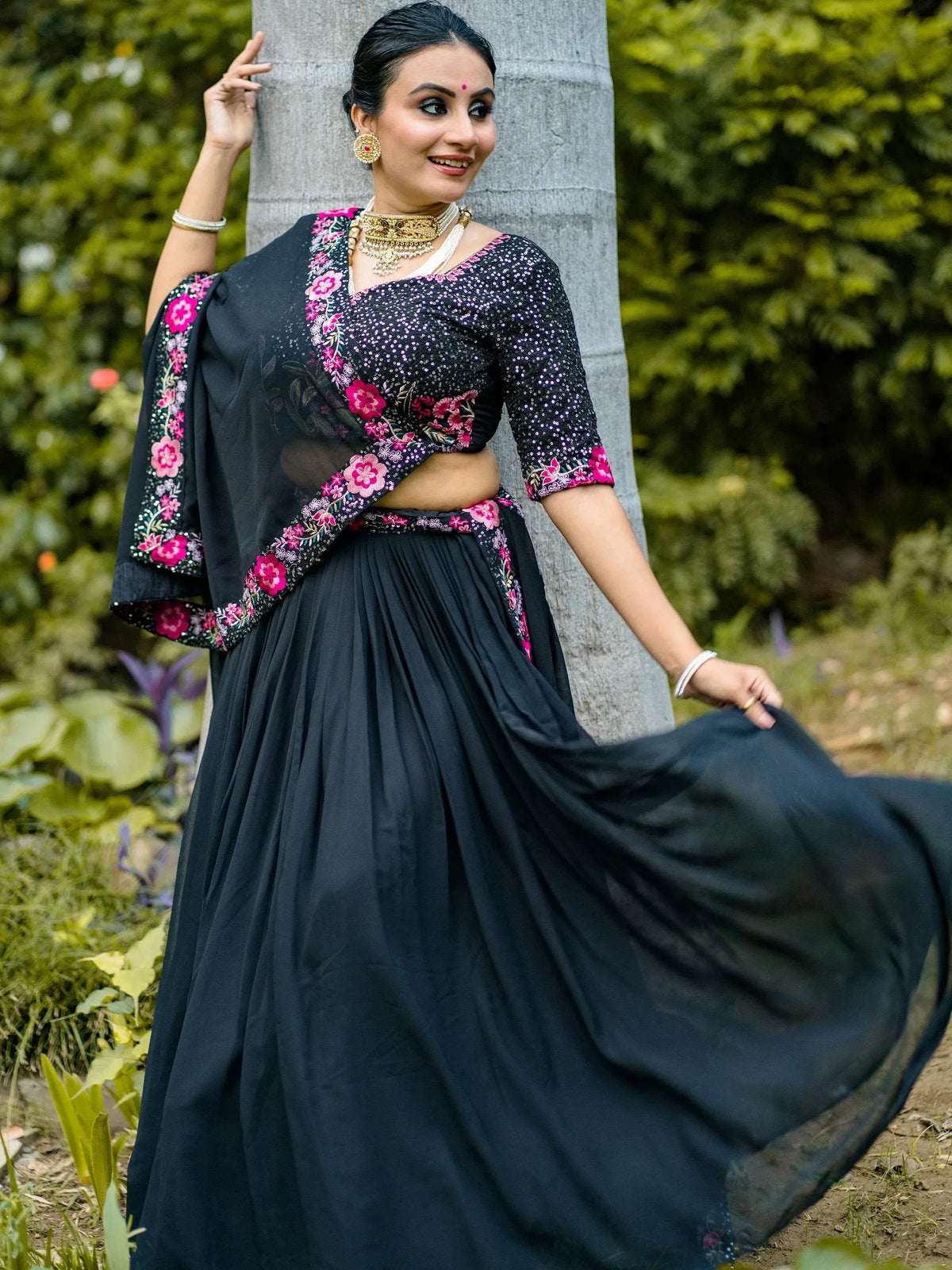 Black floral embroidered lehenga choli with sequin blouse, perfect for Indian ethnic wear occasions