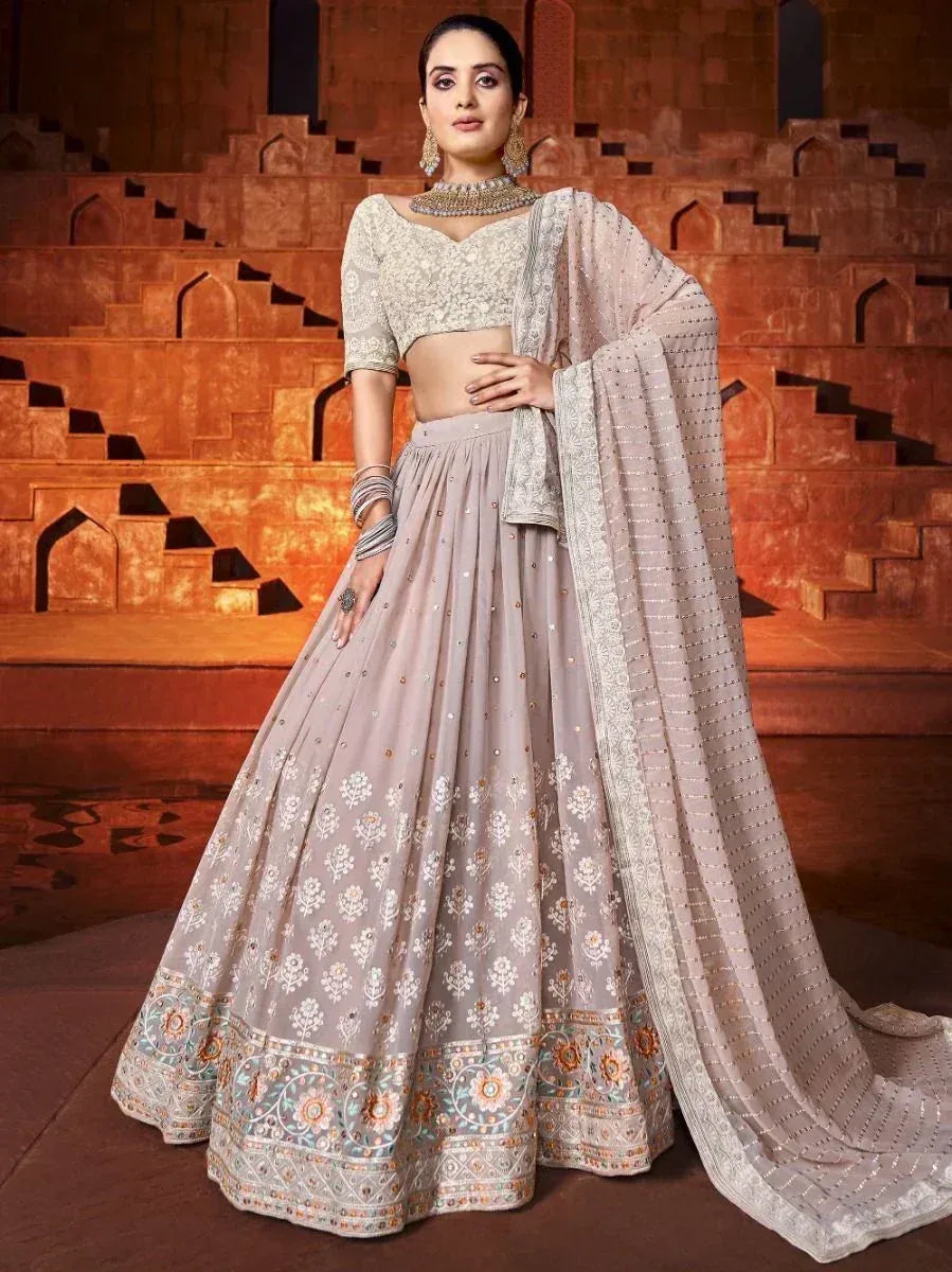 Elegant grey lehenga choli with floral embroidery and dupatta, perfect for Indian ethnic occasions.