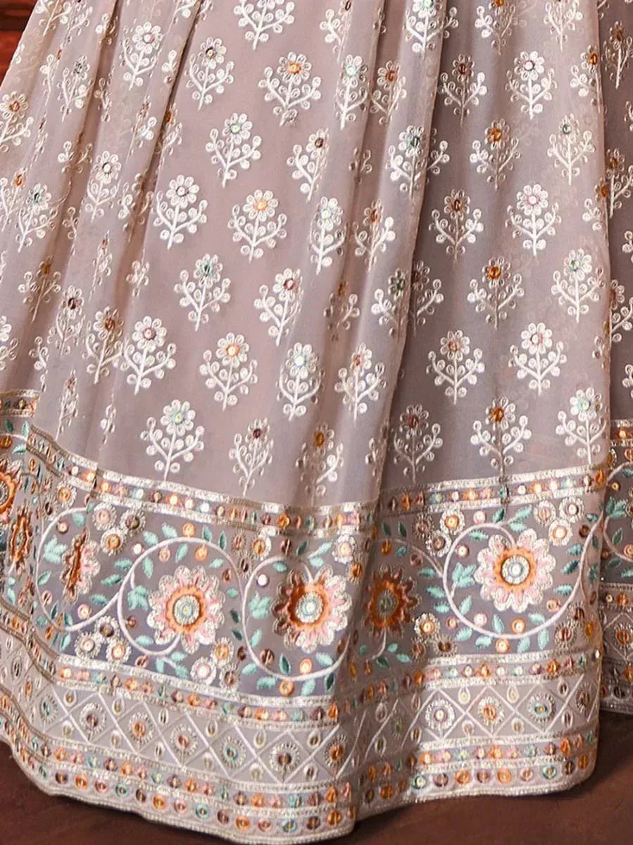 Grey embroidered lehenga with floral motifs and colorful border detailing, perfect for Indian ethnic wear.