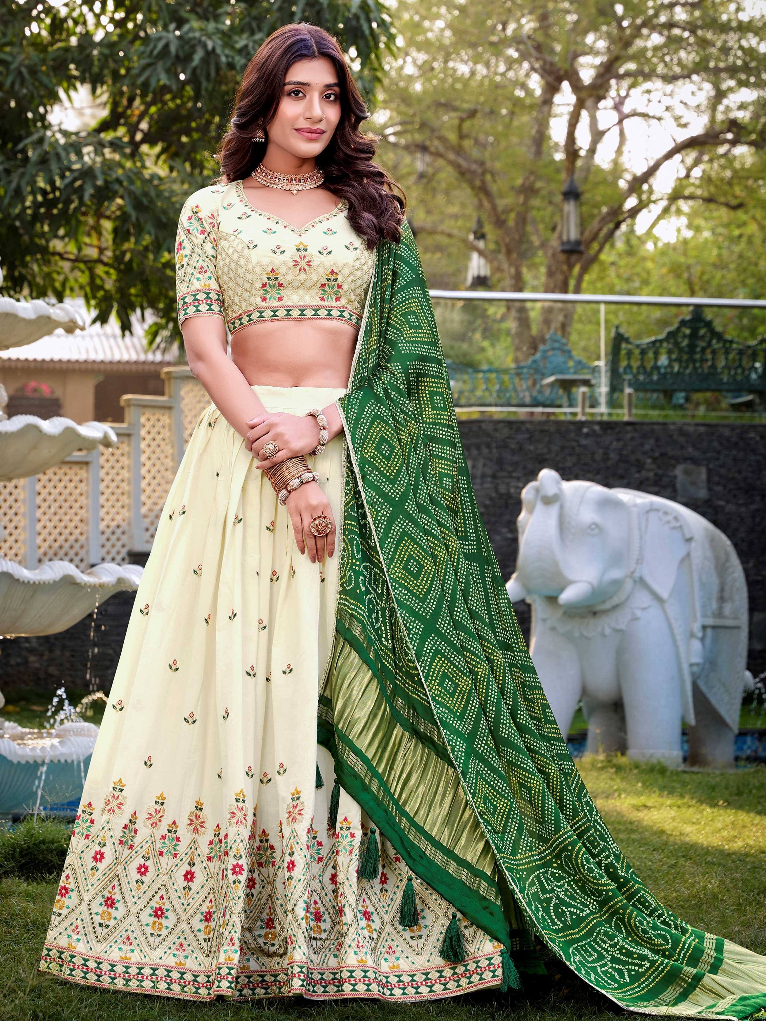 Cream embroidered lehenga choli with green dupatta, Indian ethnic wear for weddings and festivals