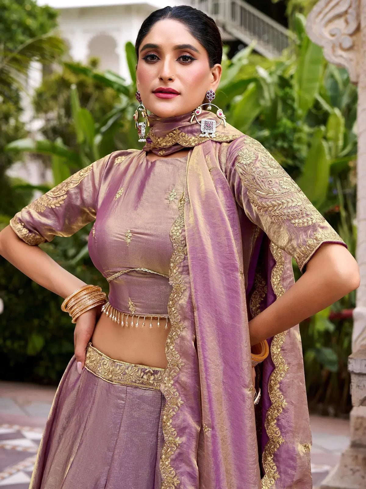 Purple designer lehenga choli with gold embroidery, perfect for Indian ethnic wear and festive occasions