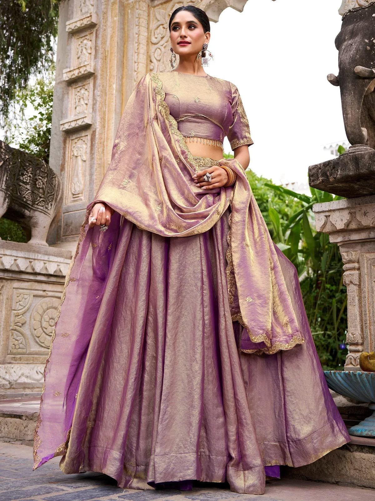 Purple and gold designer lehenga choli with intricate embroidery, perfect for Indian ethnic wear occasions