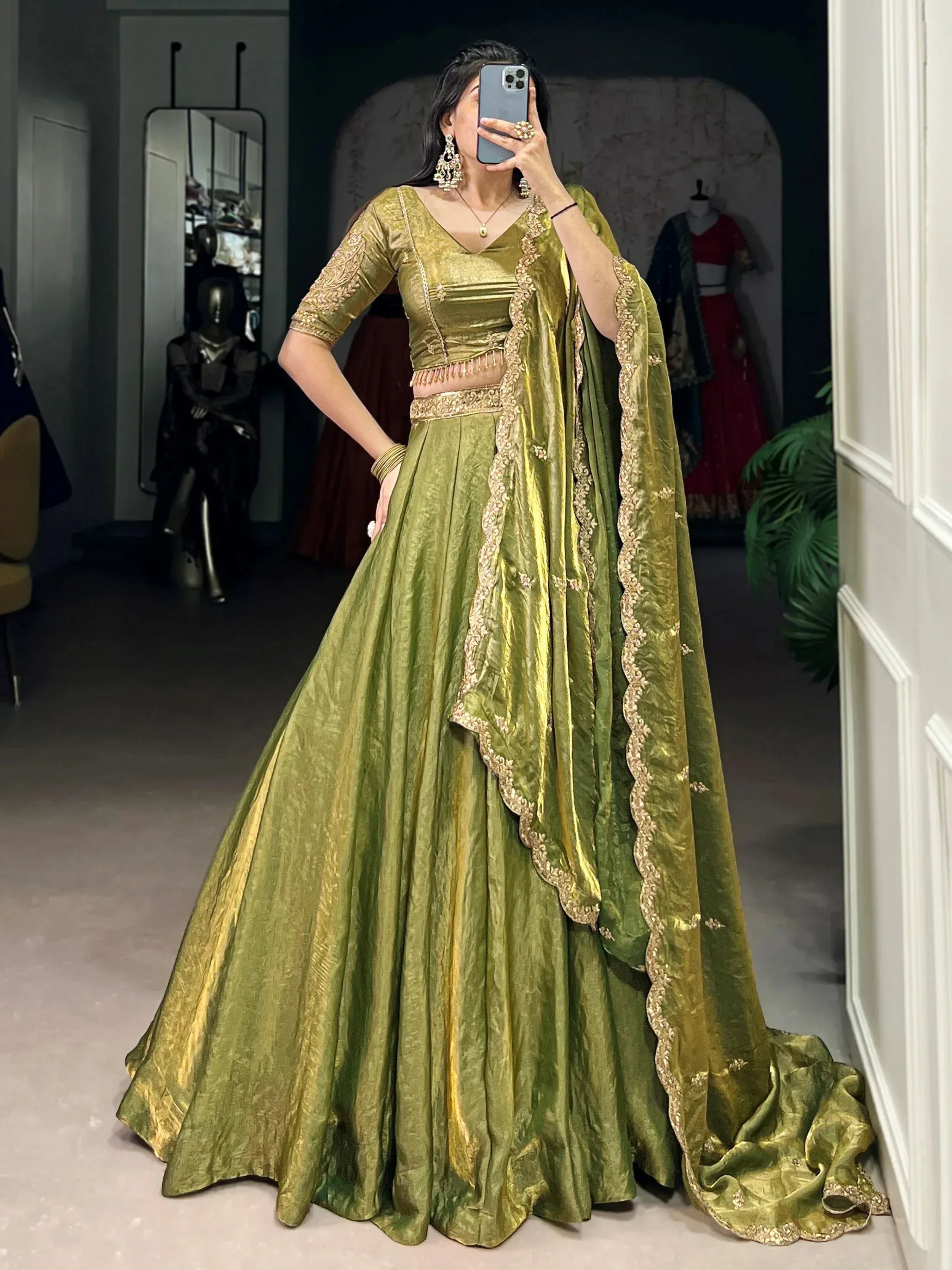 Olive green designer lehenga choli with gold embroidery, perfect for weddings and festive occasions