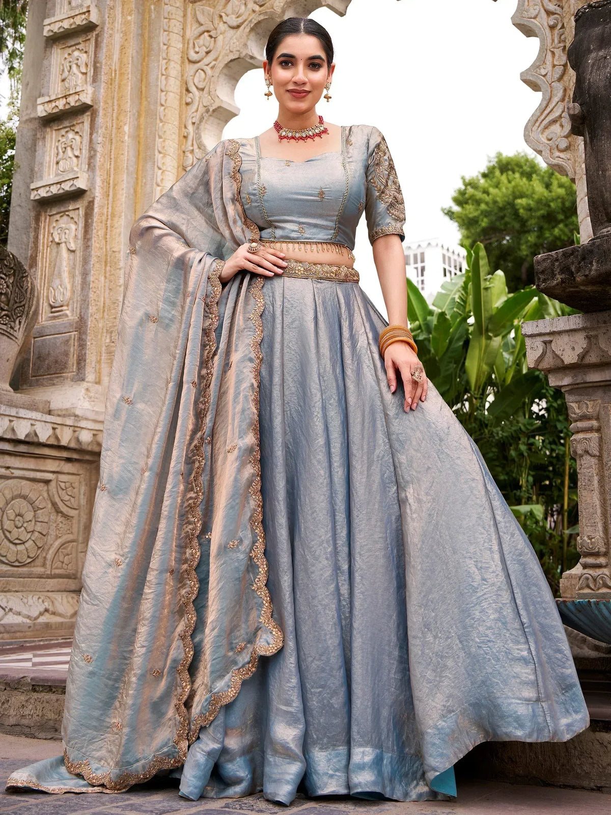 Elegant blue lehenga choli with gold embroidery, perfect for Indian ethnic wear occasions