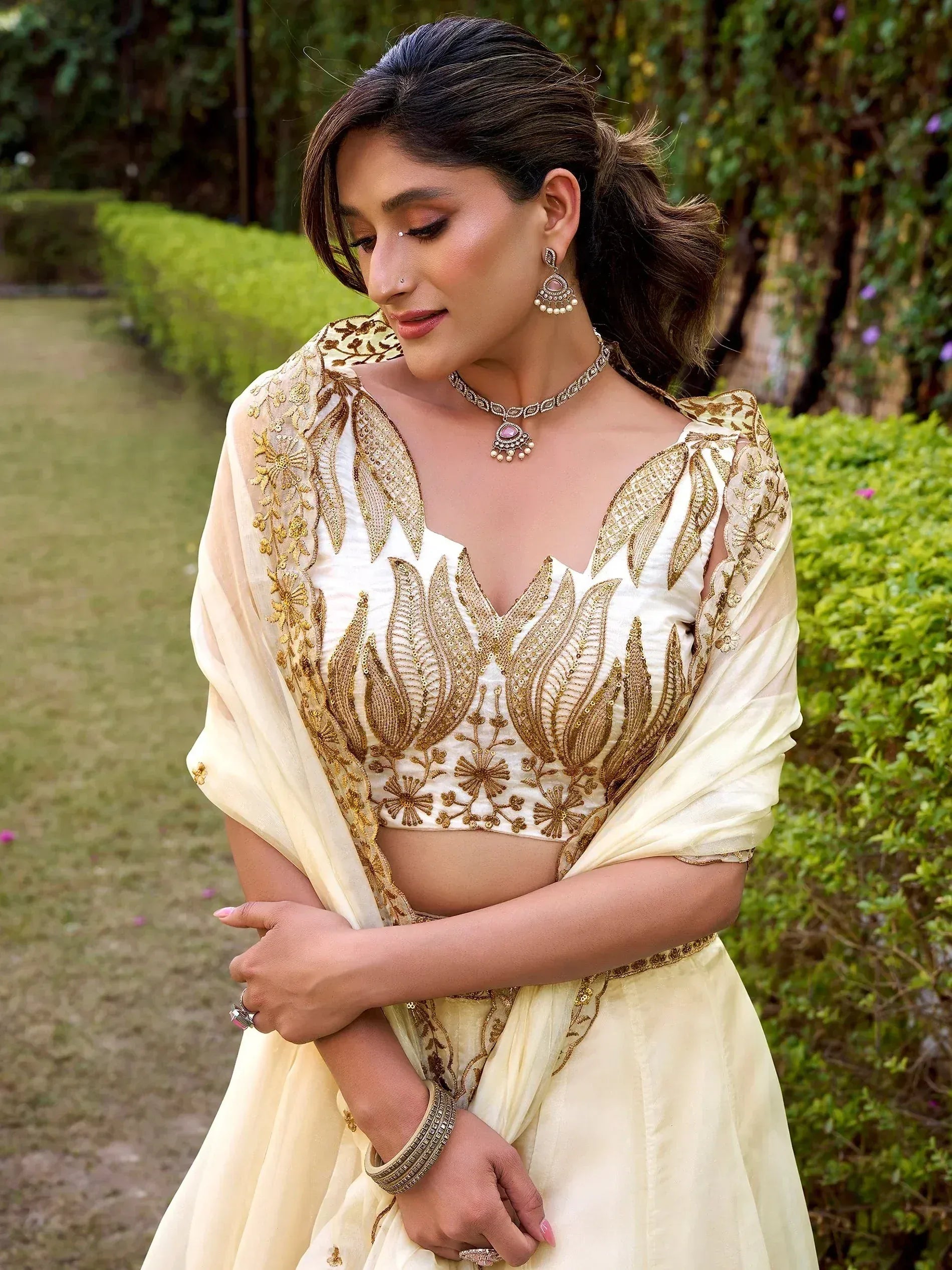 Incredible Off-White Embroidered Silk Wedding Wear Lehenga Choli
