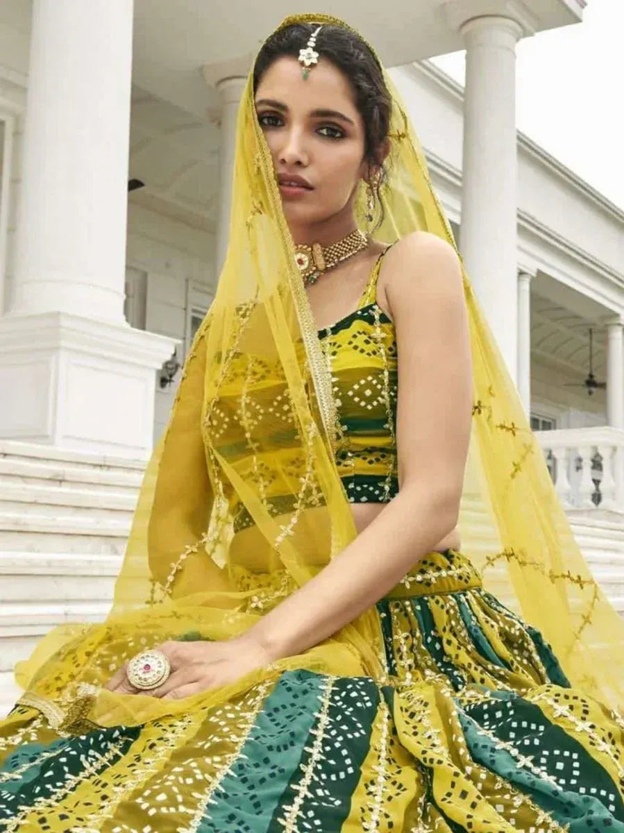 Yellow and green embroidered lehenga choli with dupatta, traditional Indian ethnic wear for women