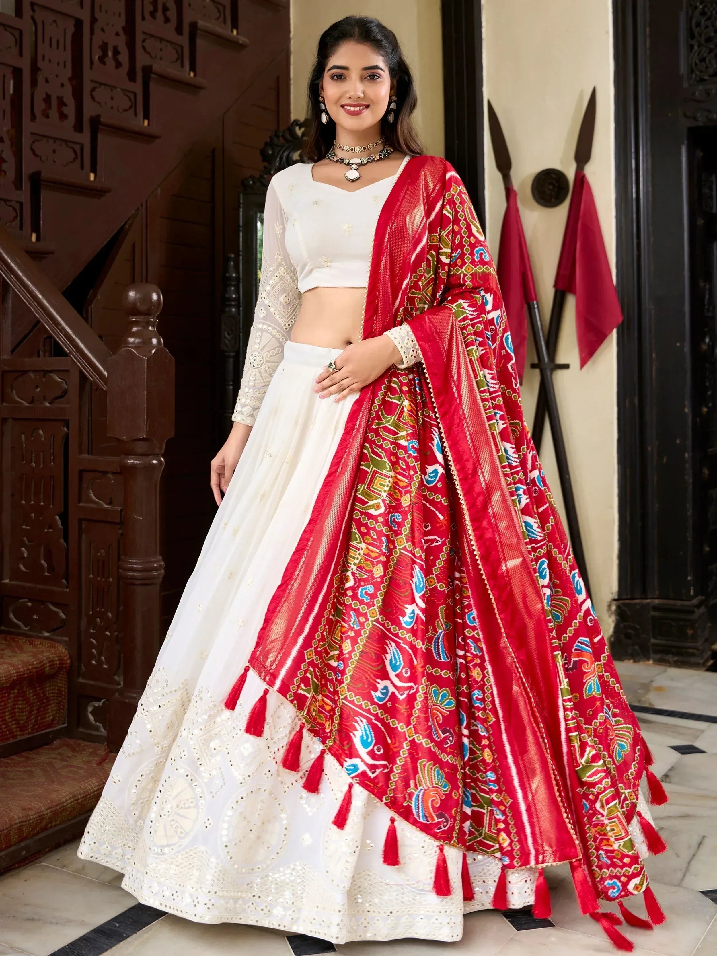 White embroidered lehenga choli with red printed dupatta, Indian ethnic wear for women