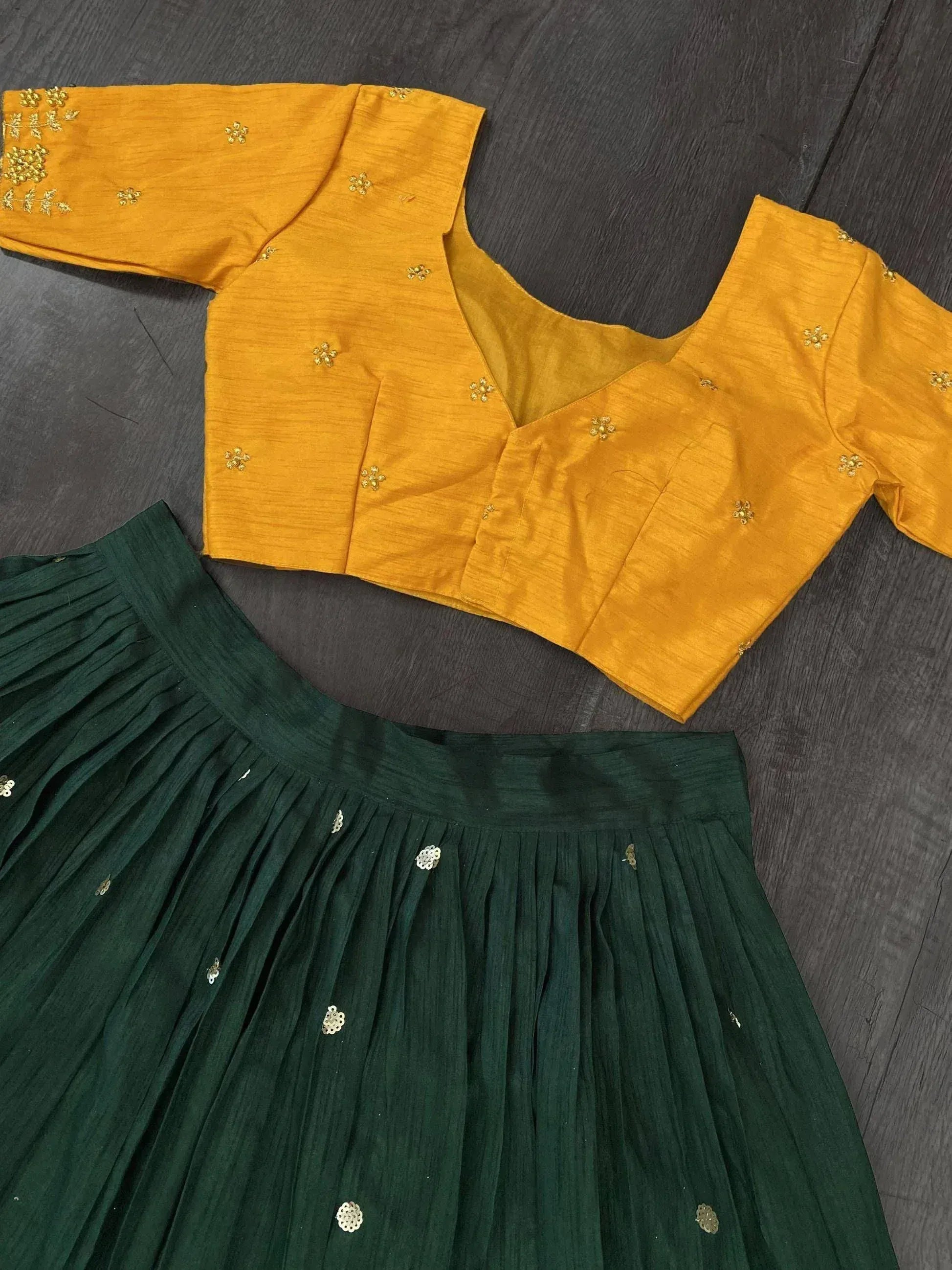 Mustard yellow embroidered blouse with green pleated skirt, Indian ethnic wear