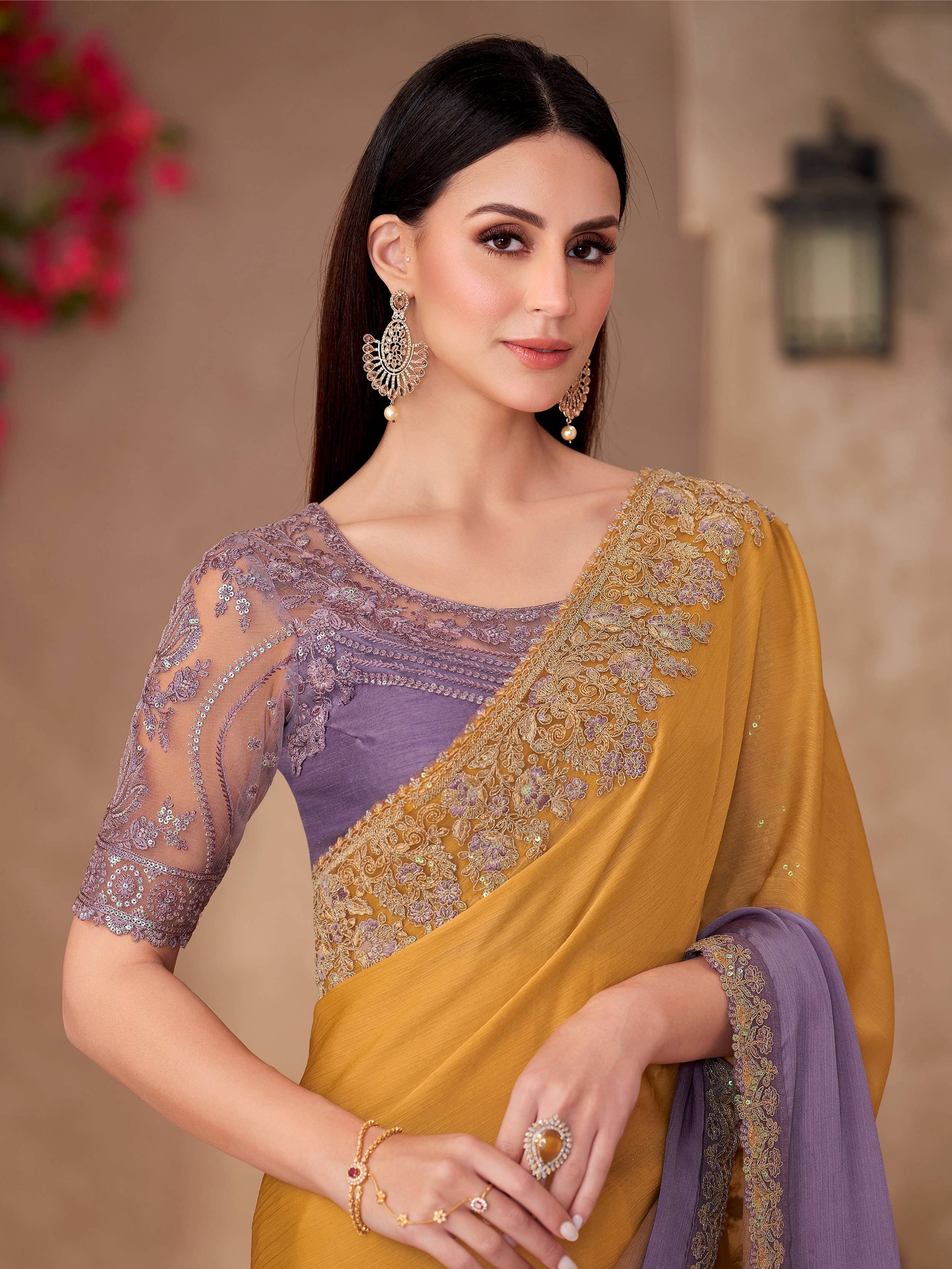 Elegant purple and mustard saree with floral embroidery and sheer sleeves, perfect for Indian ethnic wear