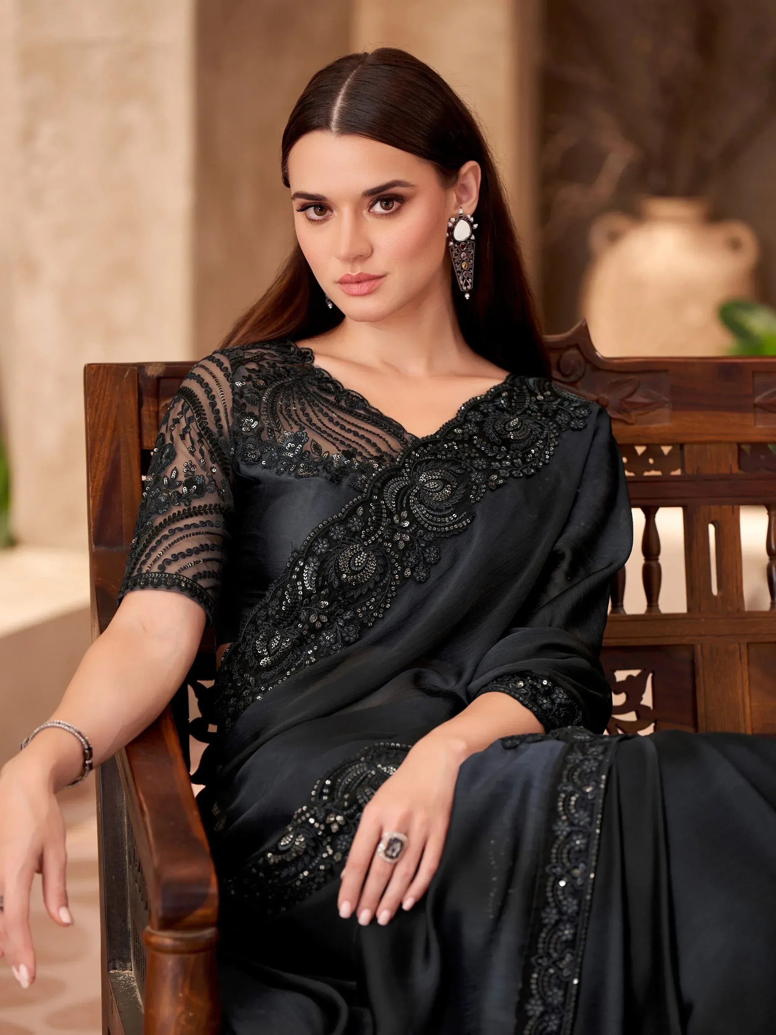Elegant black embroidered saree with sequin detailing, perfect for Indian ethnic wear occasions