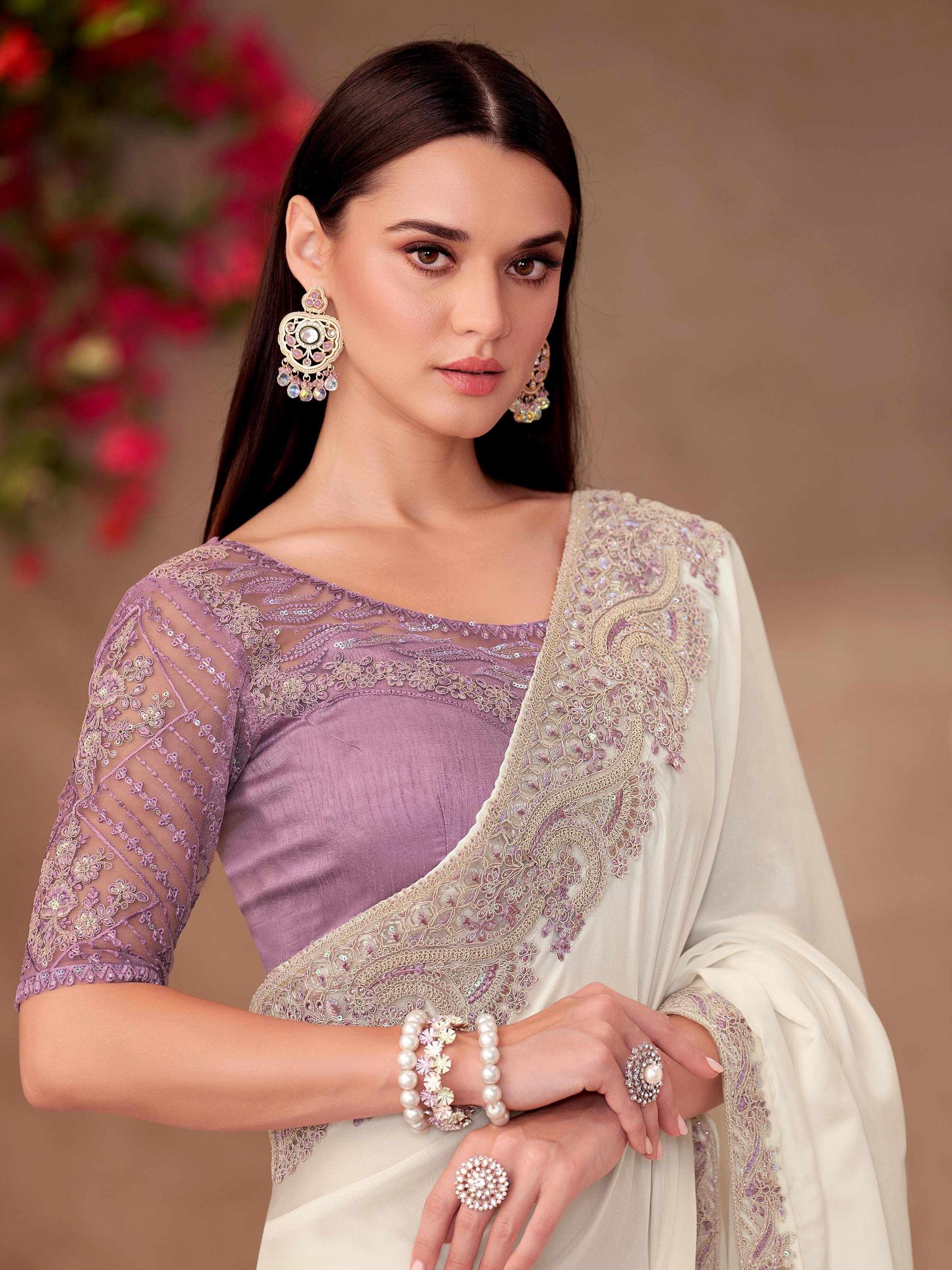 Elegant lavender and cream saree with intricate embroidery and designer jewelry for Indian ethnic wear
