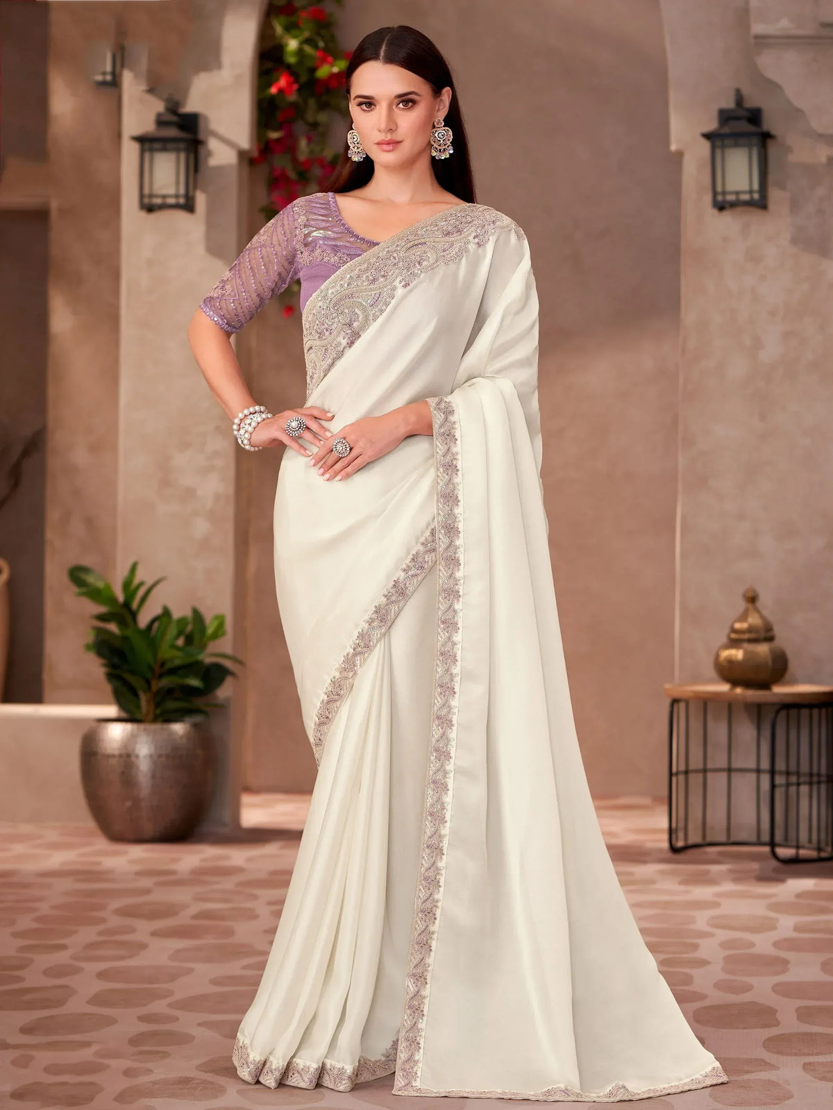Elegant off-white saree with lavender blouse, intricate embroidery, perfect for Indian ethnic occasions