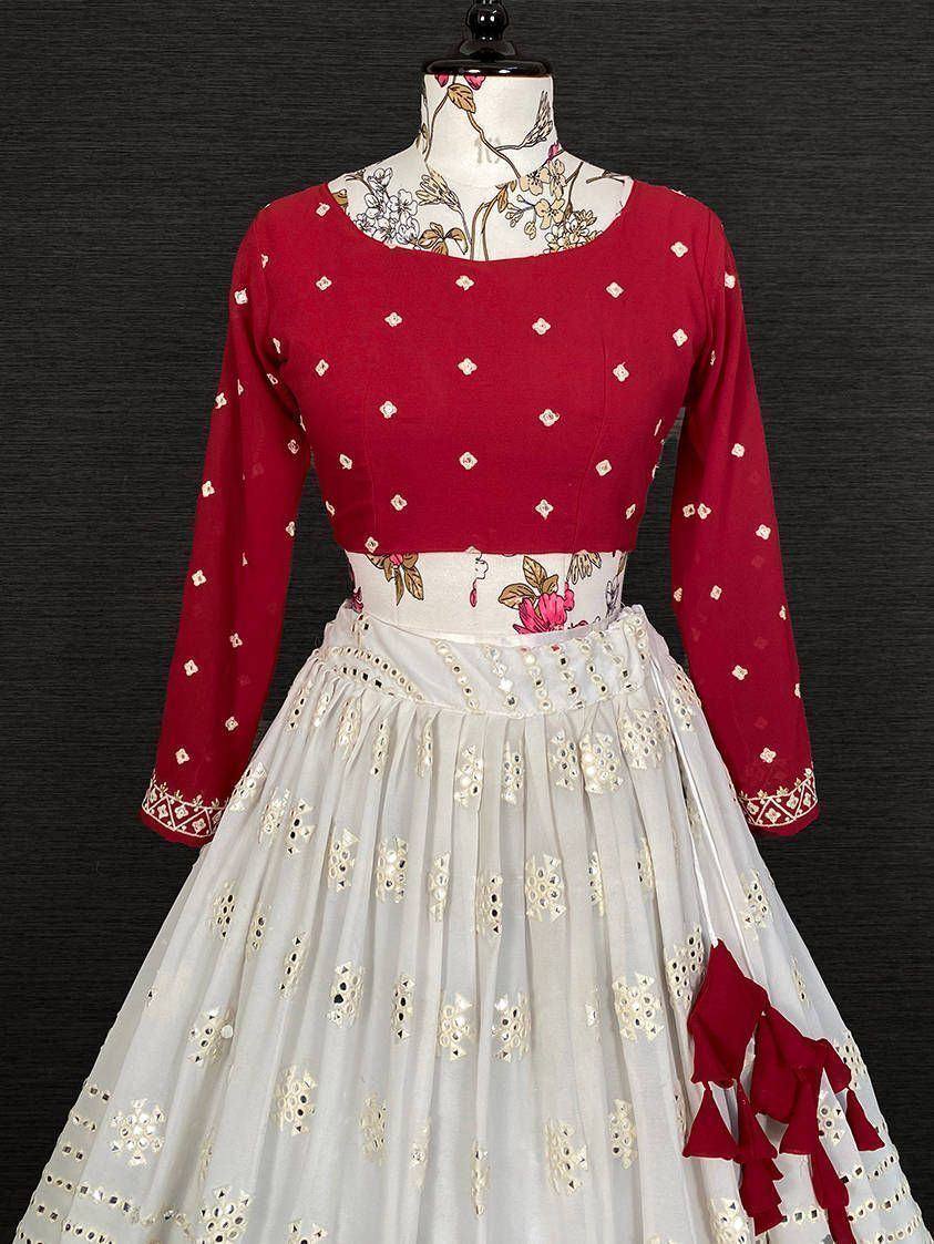 Red and white ethnic lehenga choli with floral embroidery and mirror work, perfect for festive occasions