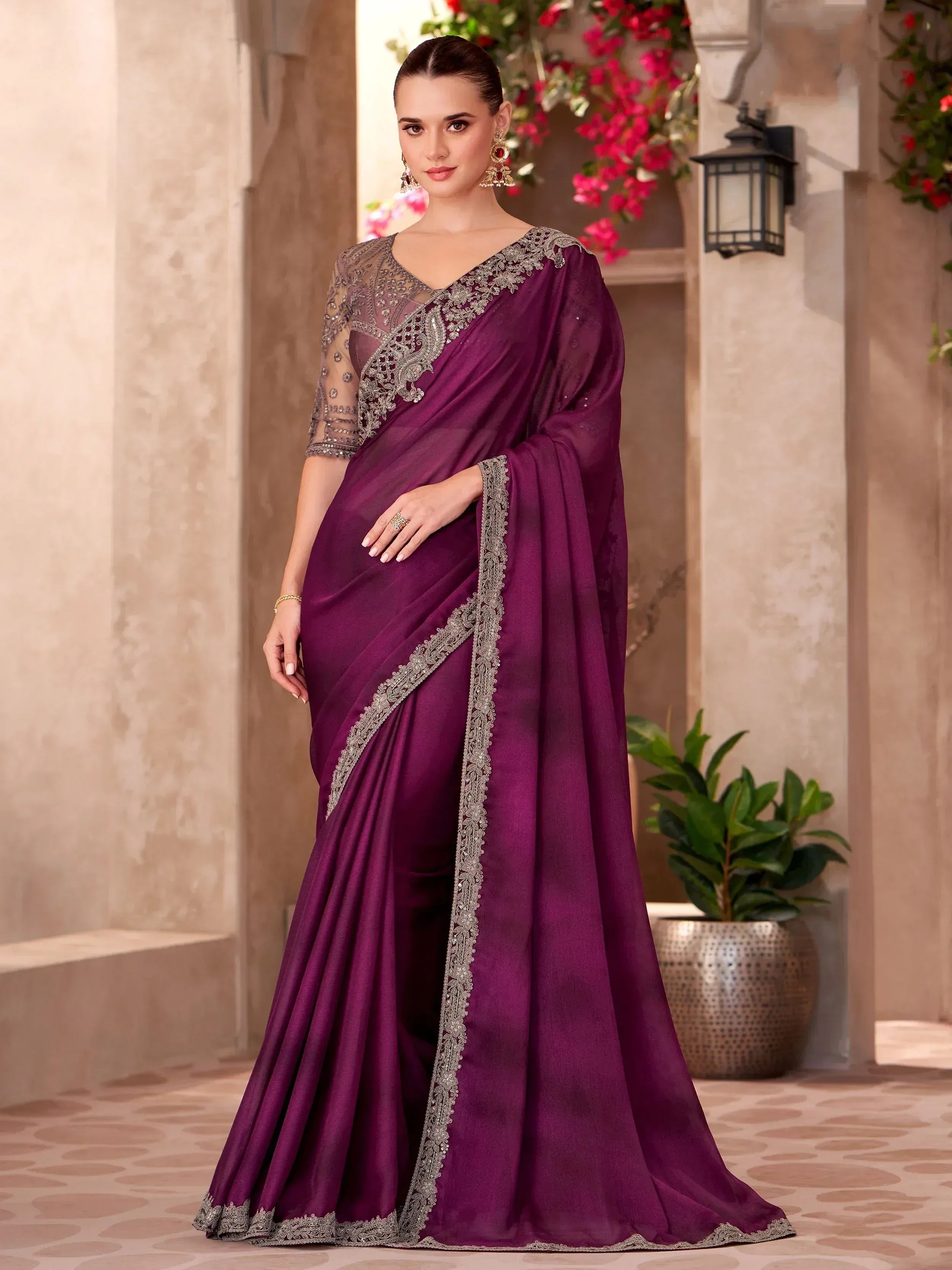 Elegant purple saree with silver embroidery, perfect for Indian ethnic wear occasions