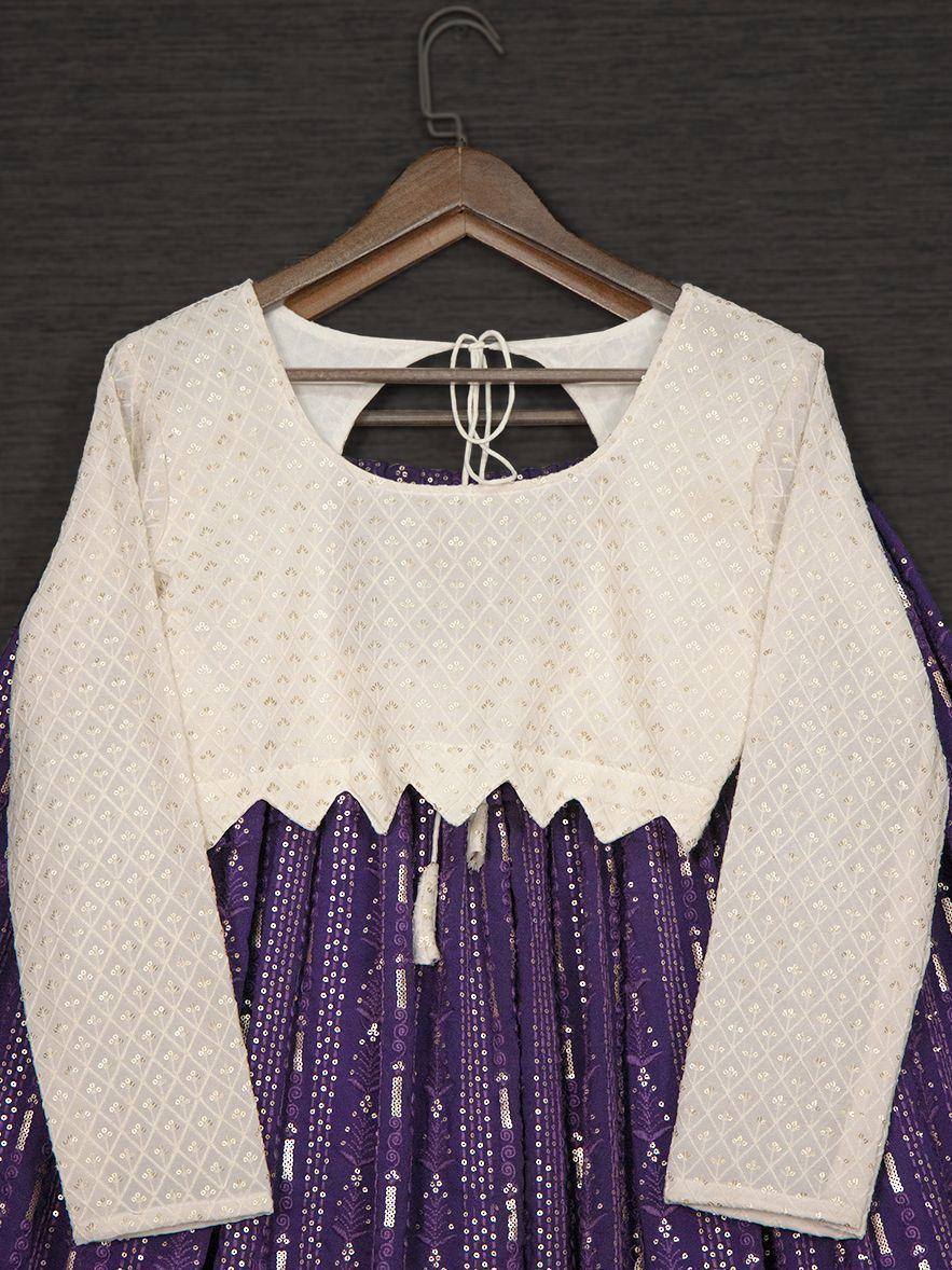 Purple and white ethnic gown with sequin detailing and scalloped neckline, perfect for Indian occasions.