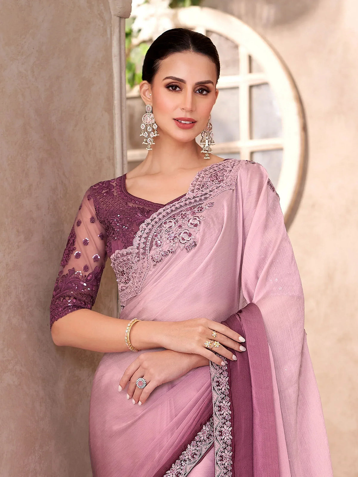Elegant pink and purple saree with lace and sequin work, perfect for Indian ethnic occasions