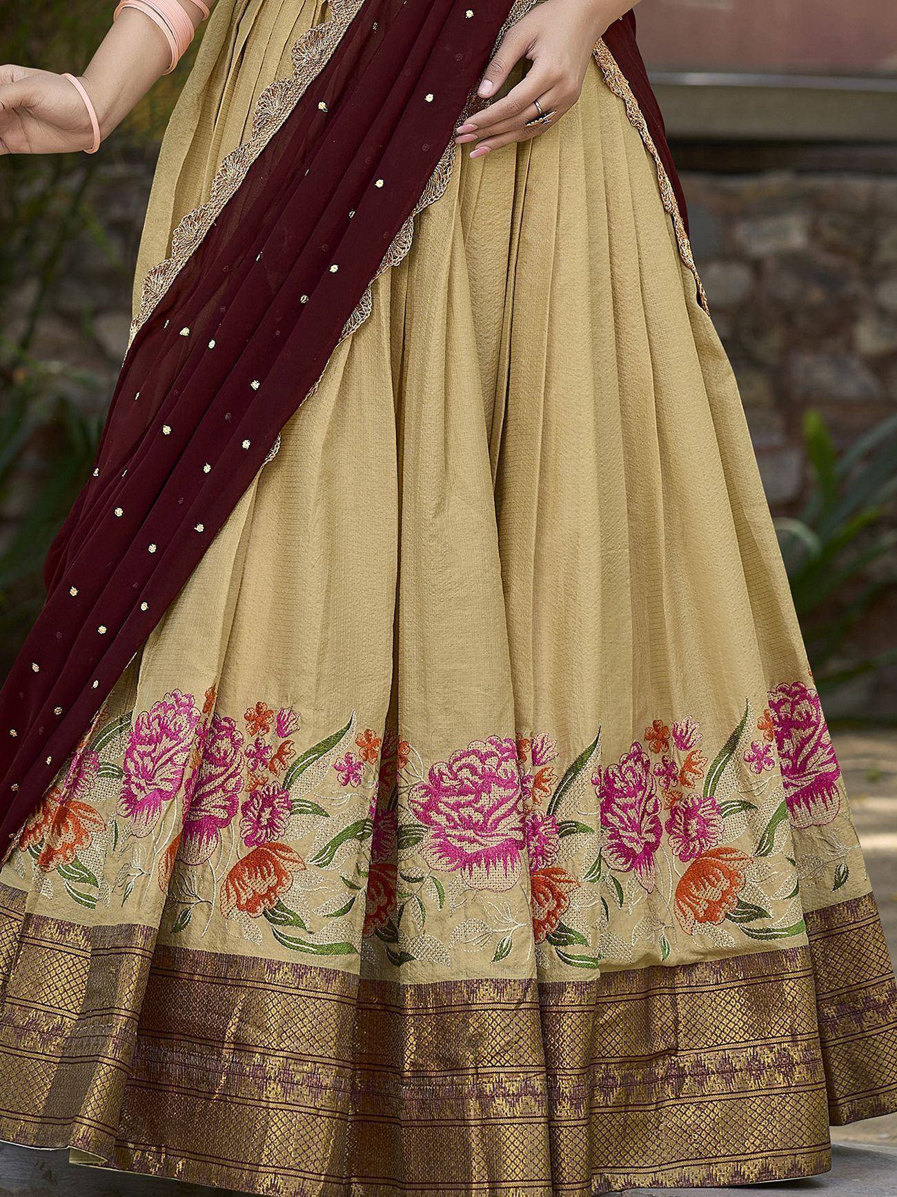 Beige lehenga with pink floral embroidery and maroon dupatta, ethnic Indian wear