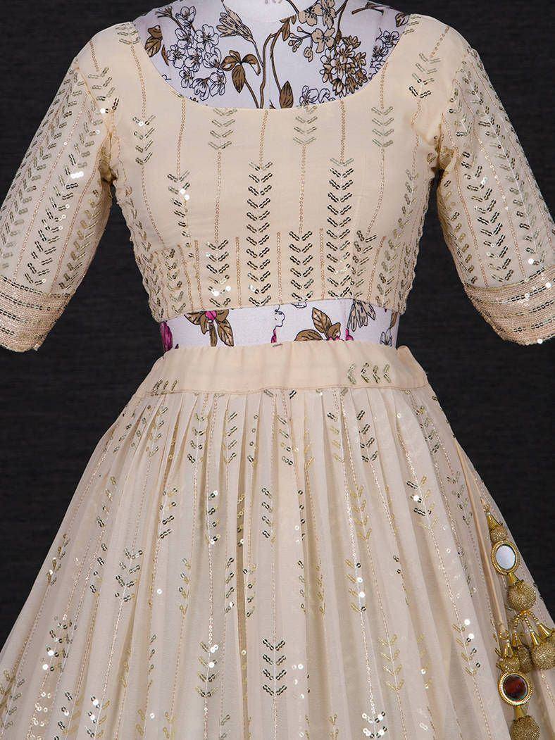 Cream sequin-embellished ethnic gown with floral print blouse, perfect for Indian occasions