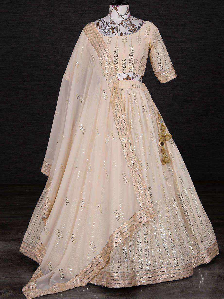 Cream designer lehenga choli with gold sequin embroidery and dupatta, perfect for Indian ethnic occasions