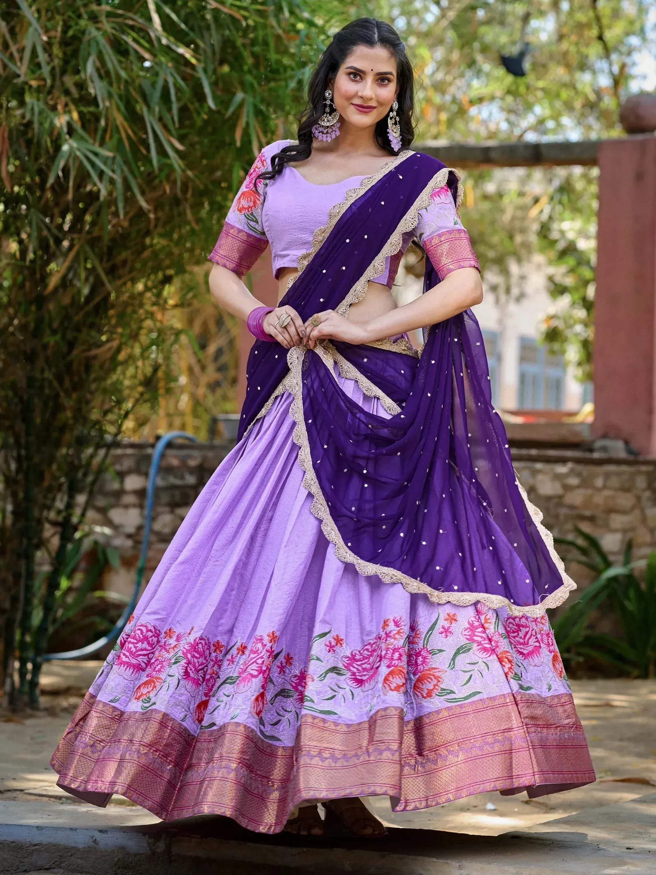 Purple and lavender floral lehenga choli with gold trim, perfect for Indian ethnic occasions