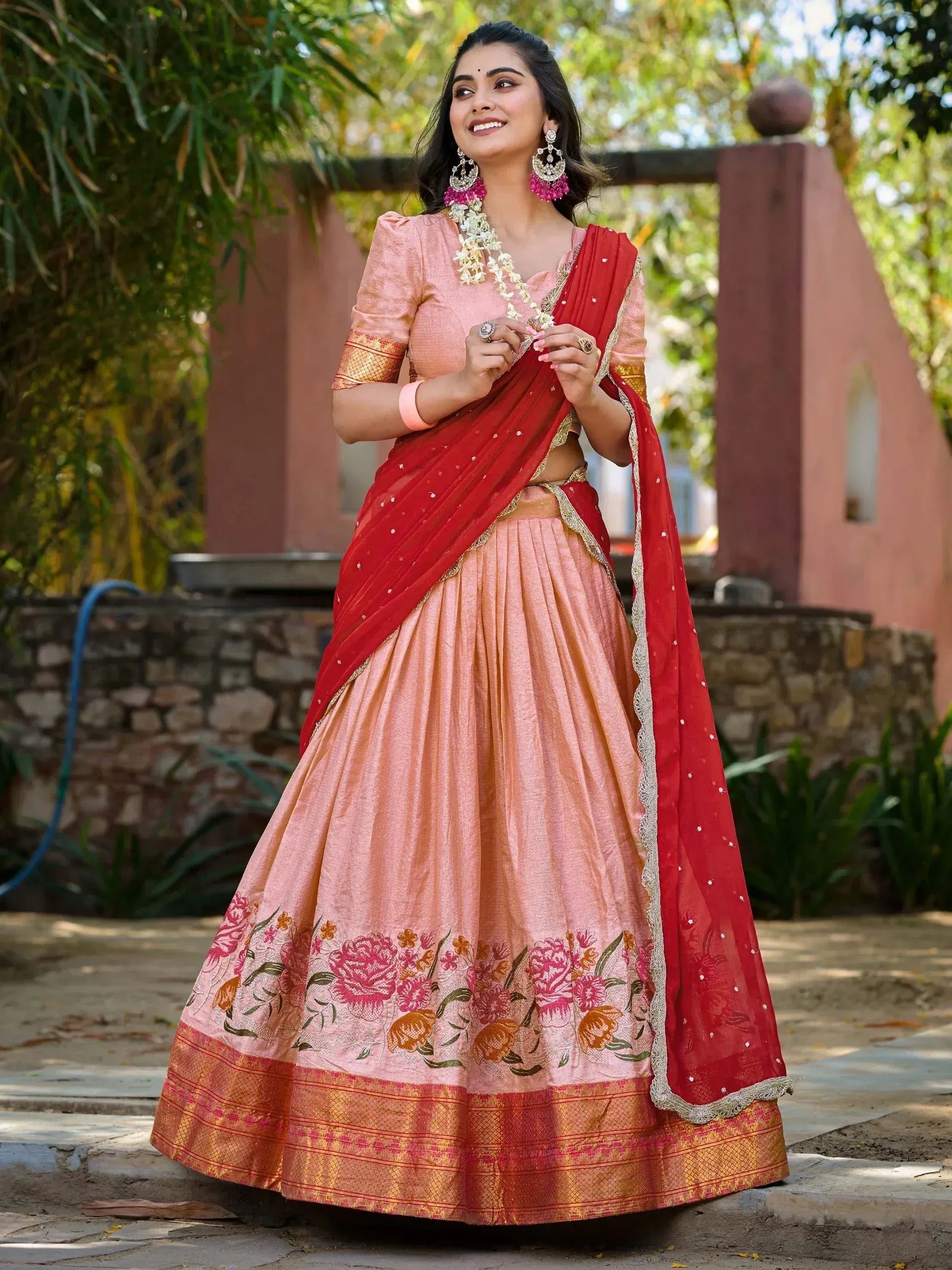 Pink floral lehenga choli with red dupatta, ethnic Indian wear for weddings and festivals