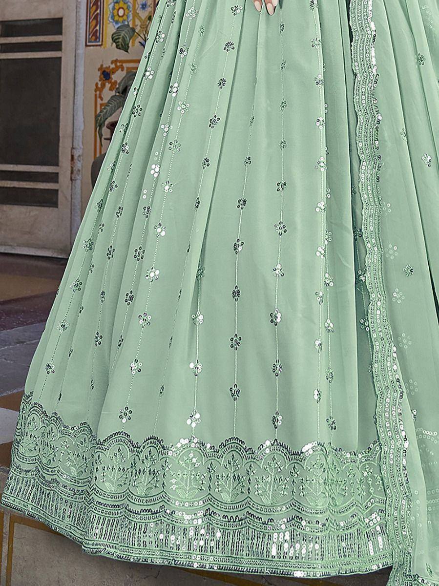 Mint green designer lehenga with floral sequin embroidery and scalloped hem, perfect for ethnic occasions