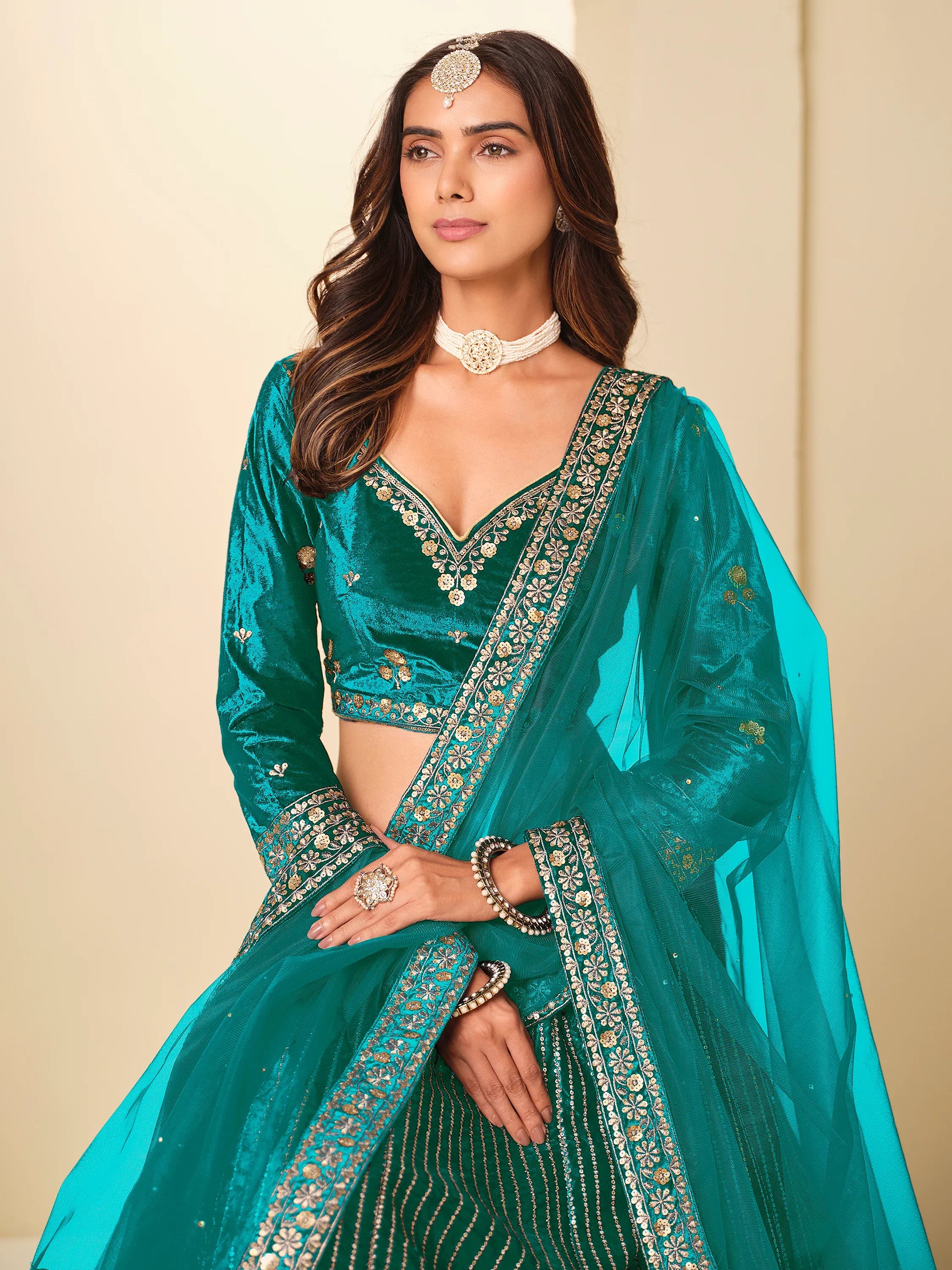 Graceful Teal Blue Embroidered Velvet Reception Wear Lehenga Choli