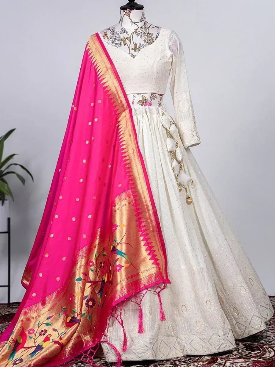 White embroidered lehenga choli with pink floral dupatta, Indian ethnic wear for weddings and festivals