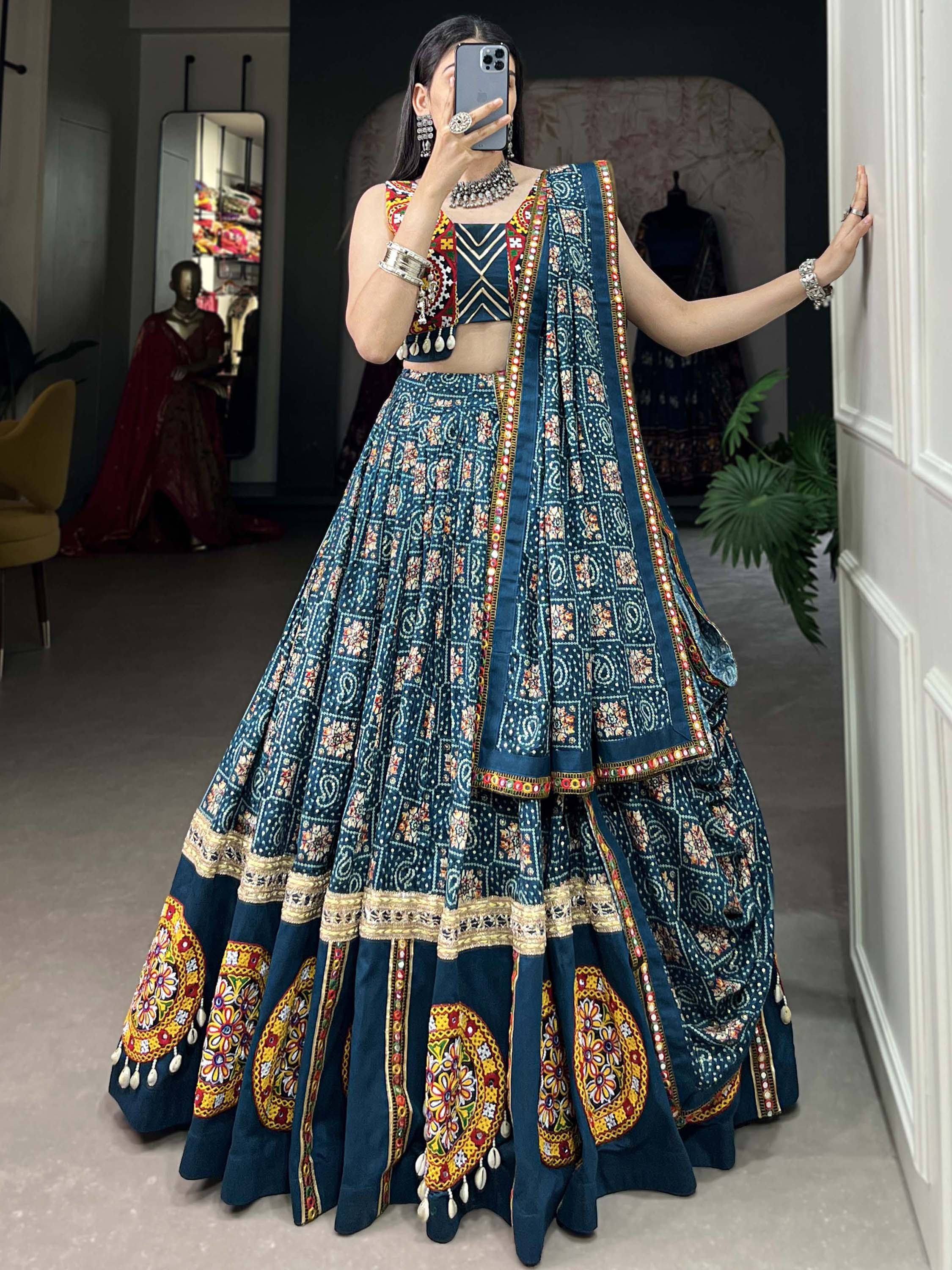 Blue embroidered lehenga choli with mirror work, perfect for Indian ethnic wear and festive occasions.