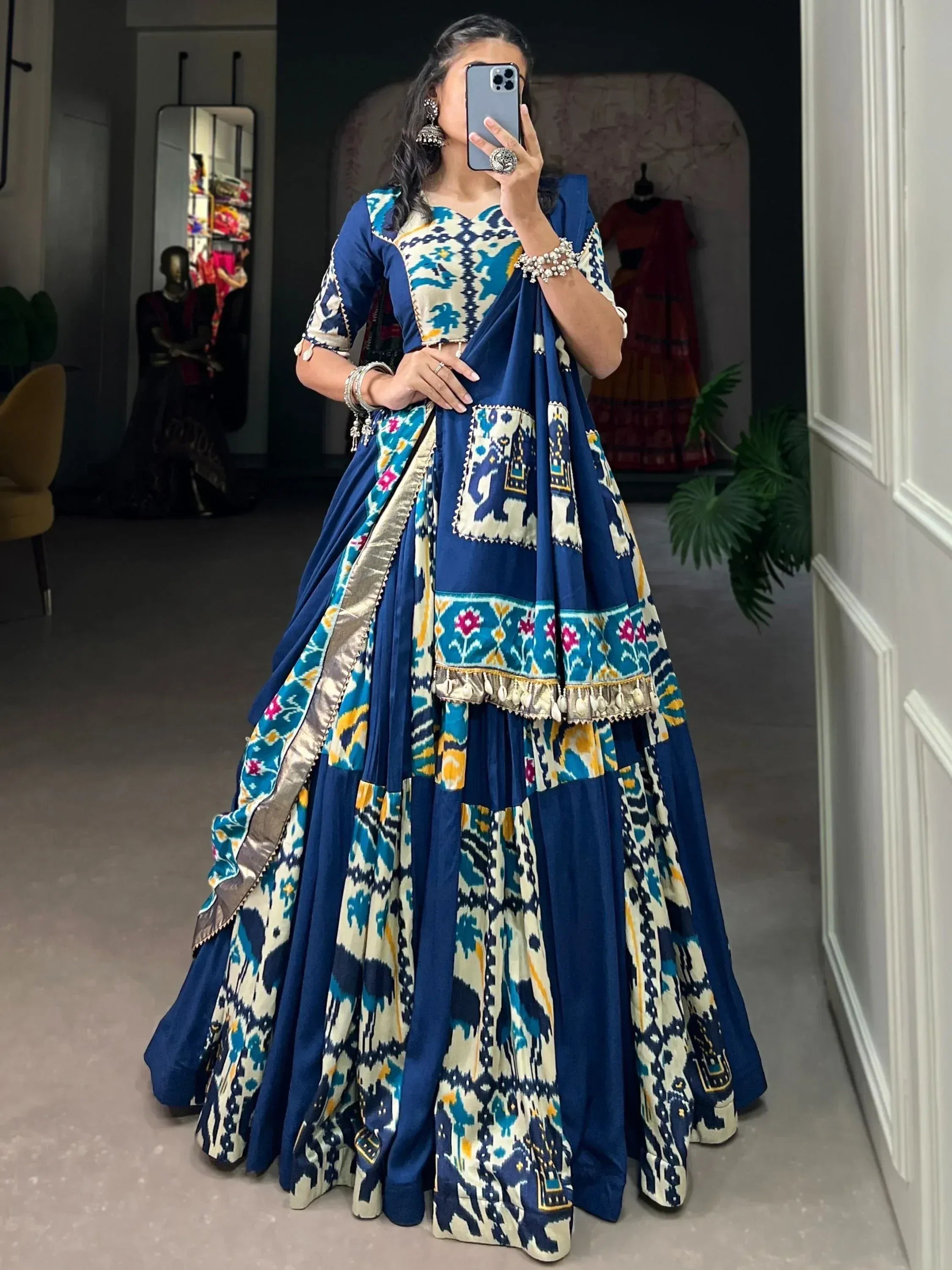 Blue and cream printed lehenga choli with elephant motifs, perfect for Indian ethnic wear occasions