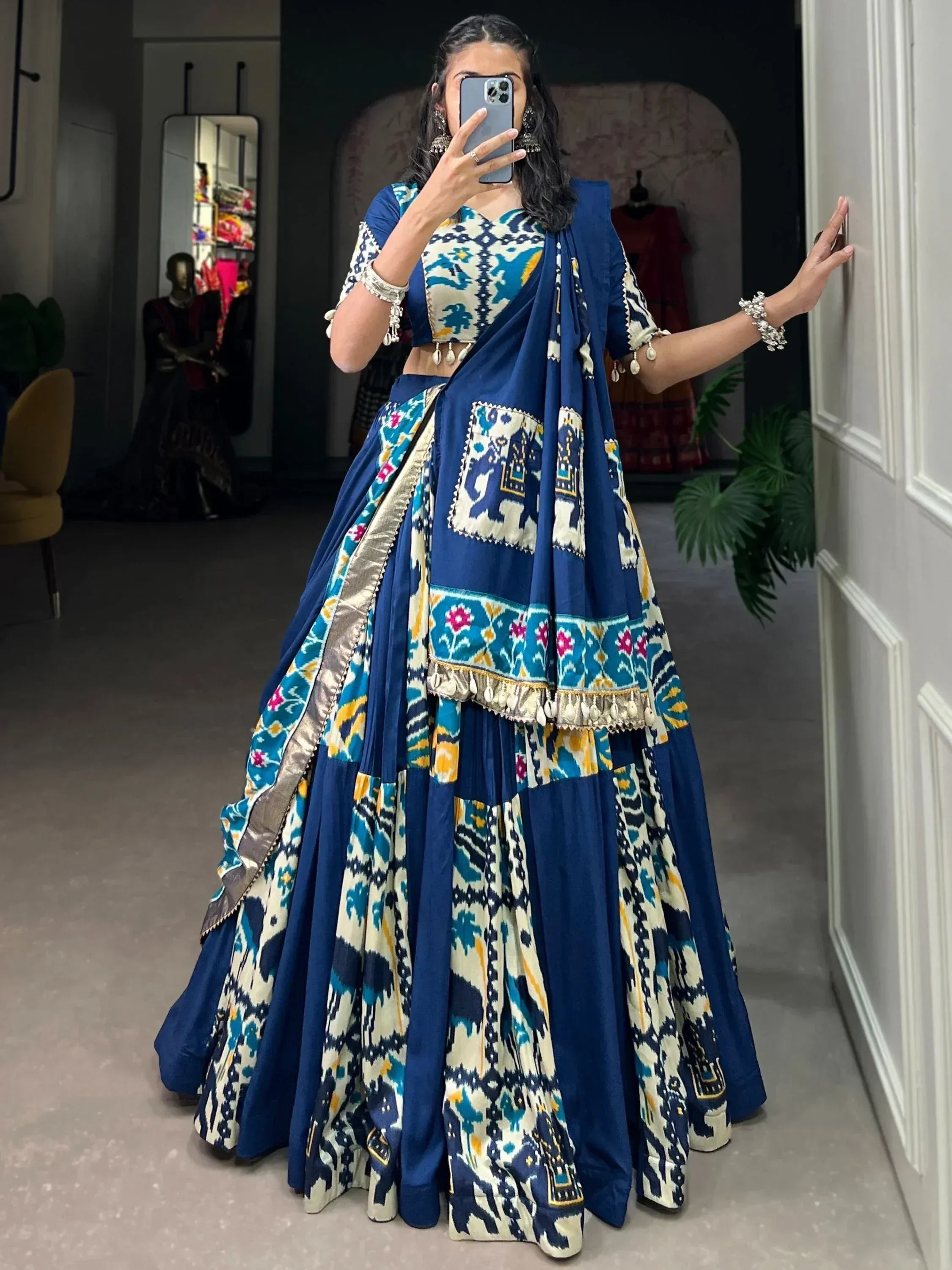 Blue and cream printed lehenga choli with elephant motifs, perfect for Indian ethnic wear events.