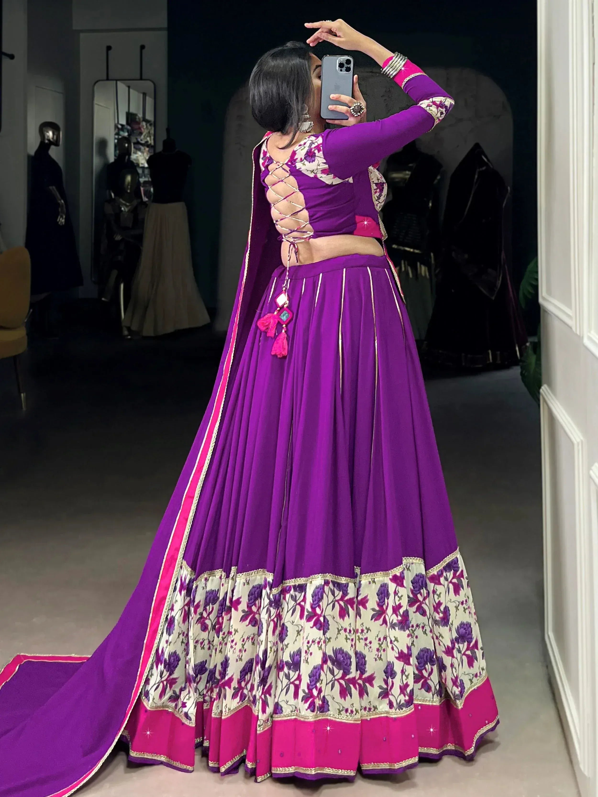 Purple floral lehenga choli with lace-up back, perfect for Indian ethnic wear and festive occasions.