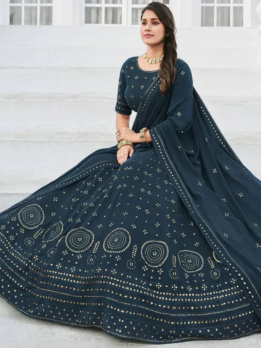 Dark blue designer lehenga choli with gold mirror work, perfect for Indian ethnic occasions