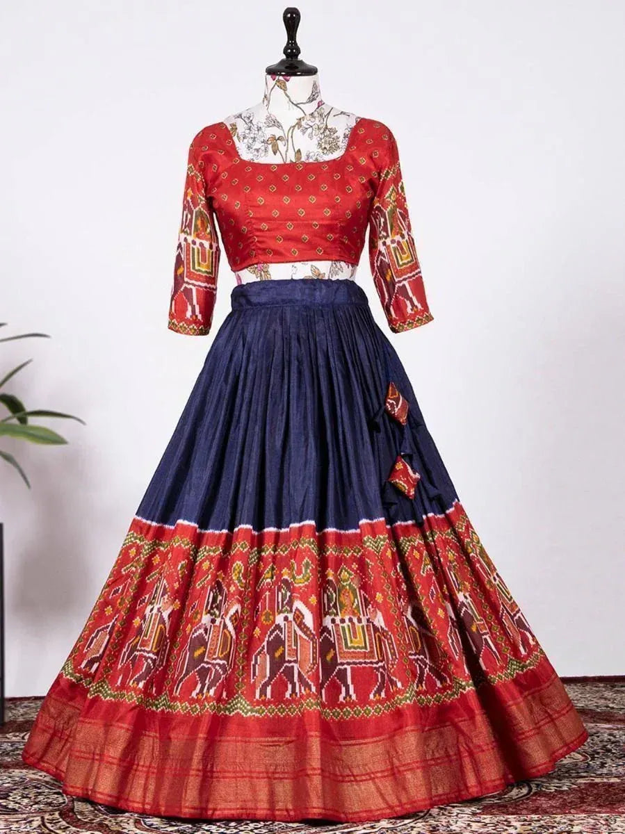 Red and navy blue ethnic lehenga choli with elephant print, perfect for Indian festivals and weddings