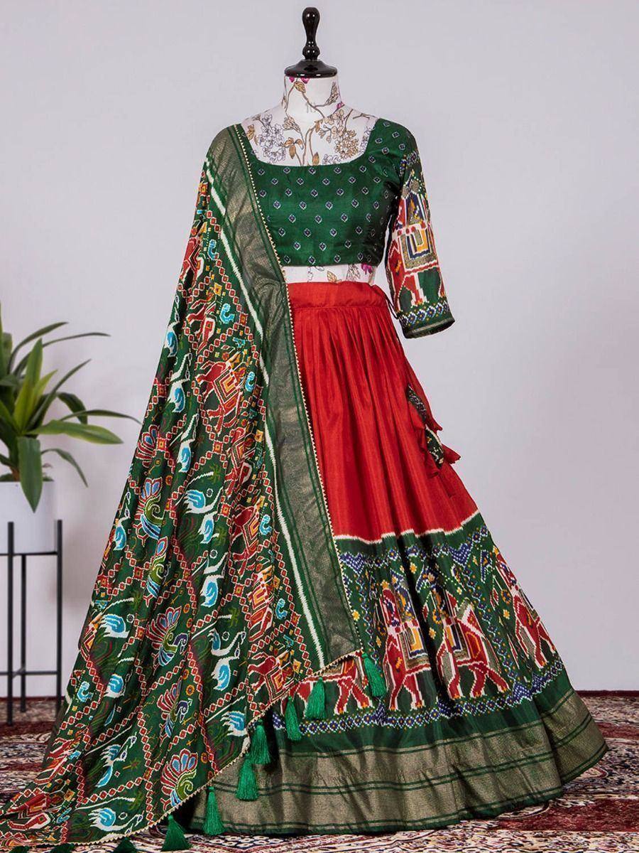 Green and red ethnic lehenga choli with printed dupatta, perfect for Indian weddings and festive occasions