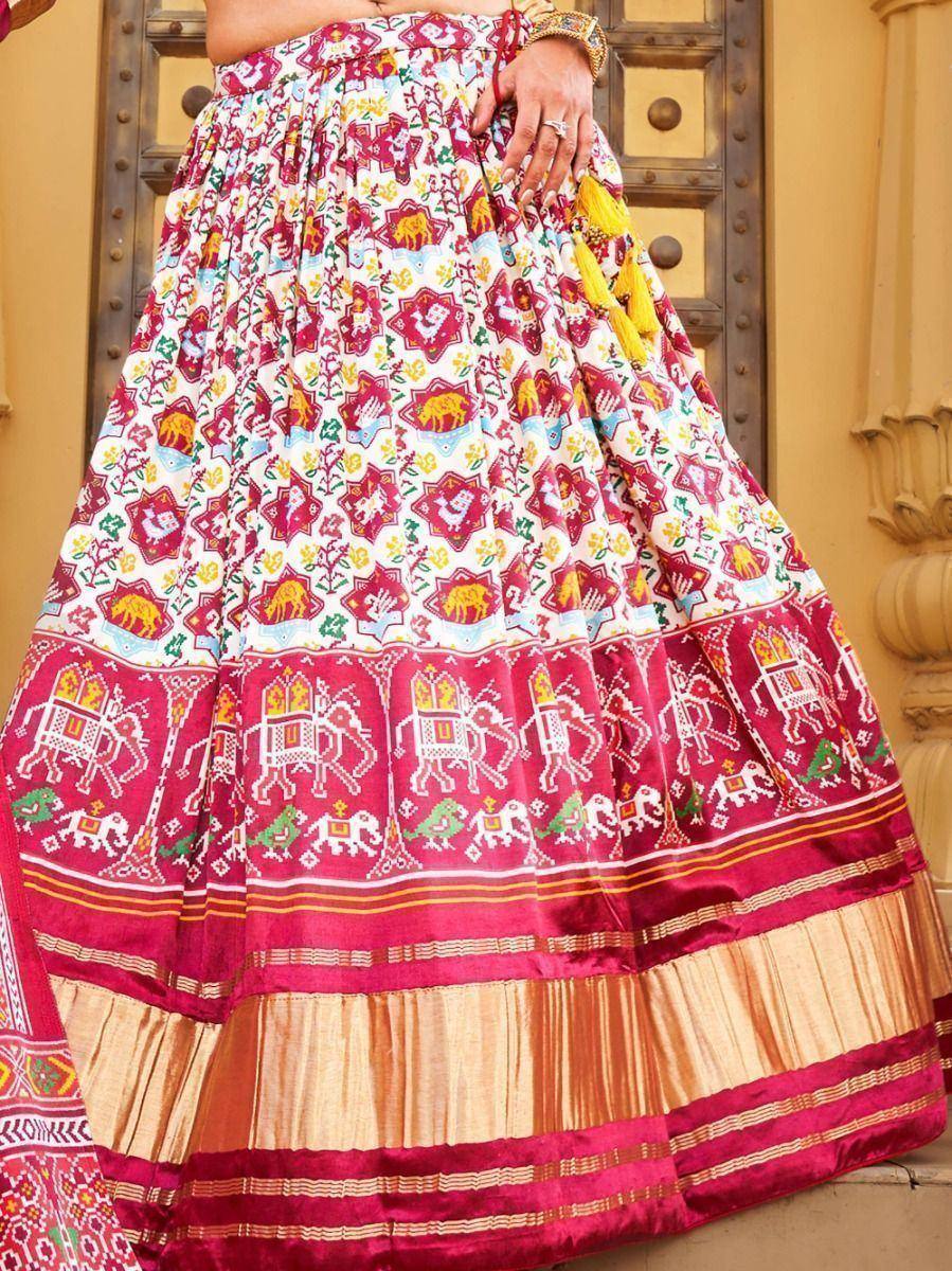 Vibrant Indian lehenga with elephant and floral prints, perfect for ethnic wear and festive occasions