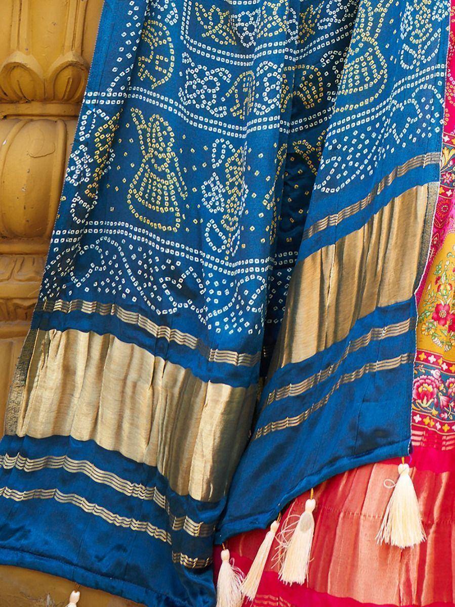 Blue and gold ethnic saree with intricate block print patterns and tassels, ideal for traditional Indian wear