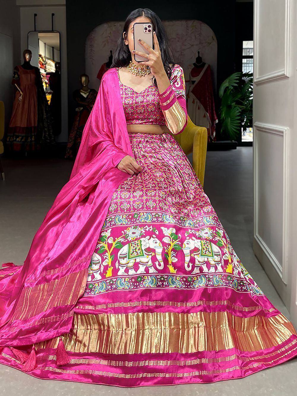 Pink embroidered lehenga choli with elephant print, perfect for Indian ethnic wear and festive occasions.