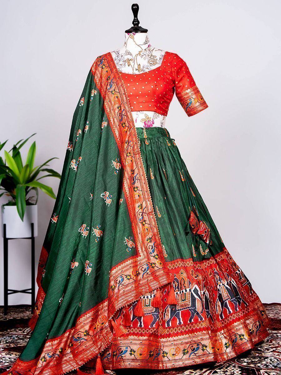 Green and red printed lehenga choli with elephant motifs, perfect for Indian ethnic wear occasions