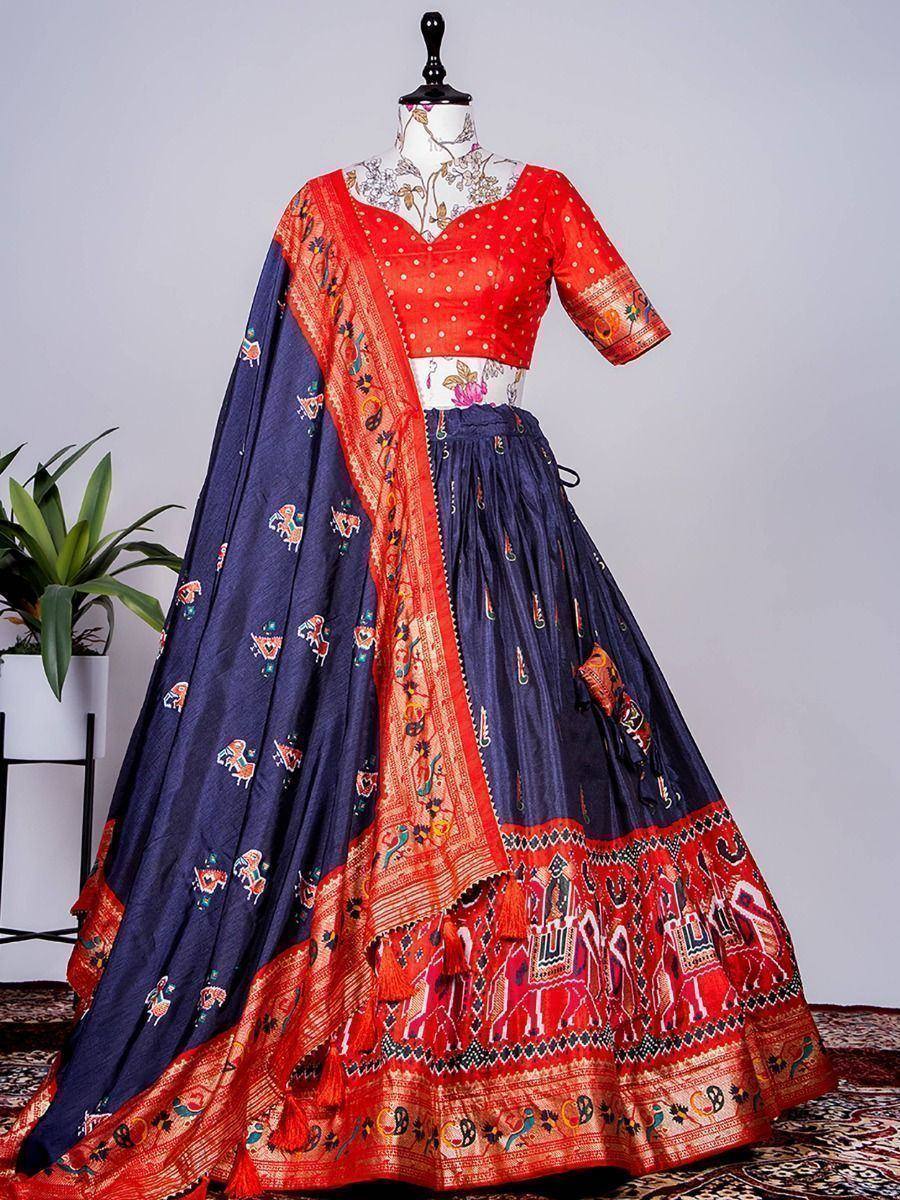 Red and navy blue printed lehenga choli with elephant motifs, perfect for Indian ethnic wear occasions