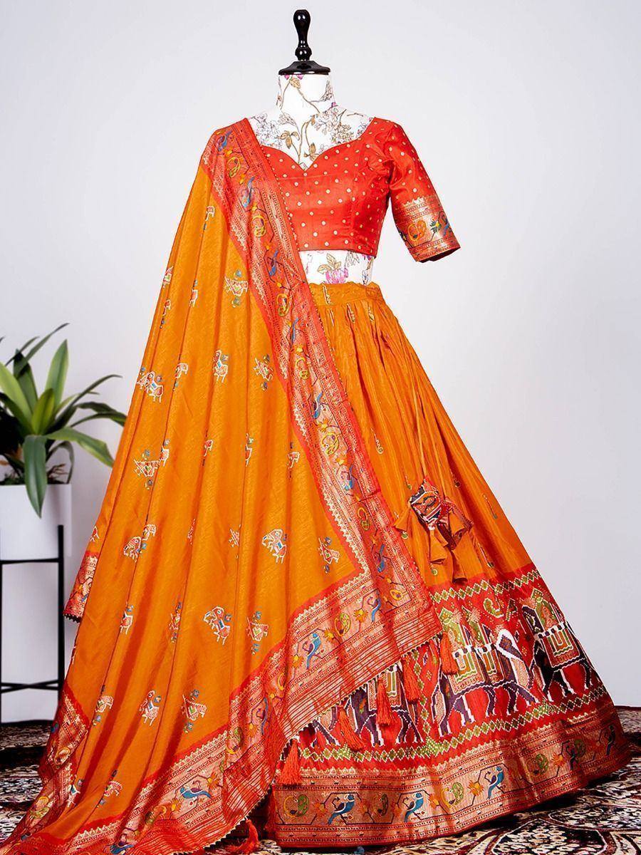 Orange printed lehenga choli with embroidered dupatta, ethnic Indian wear for women
