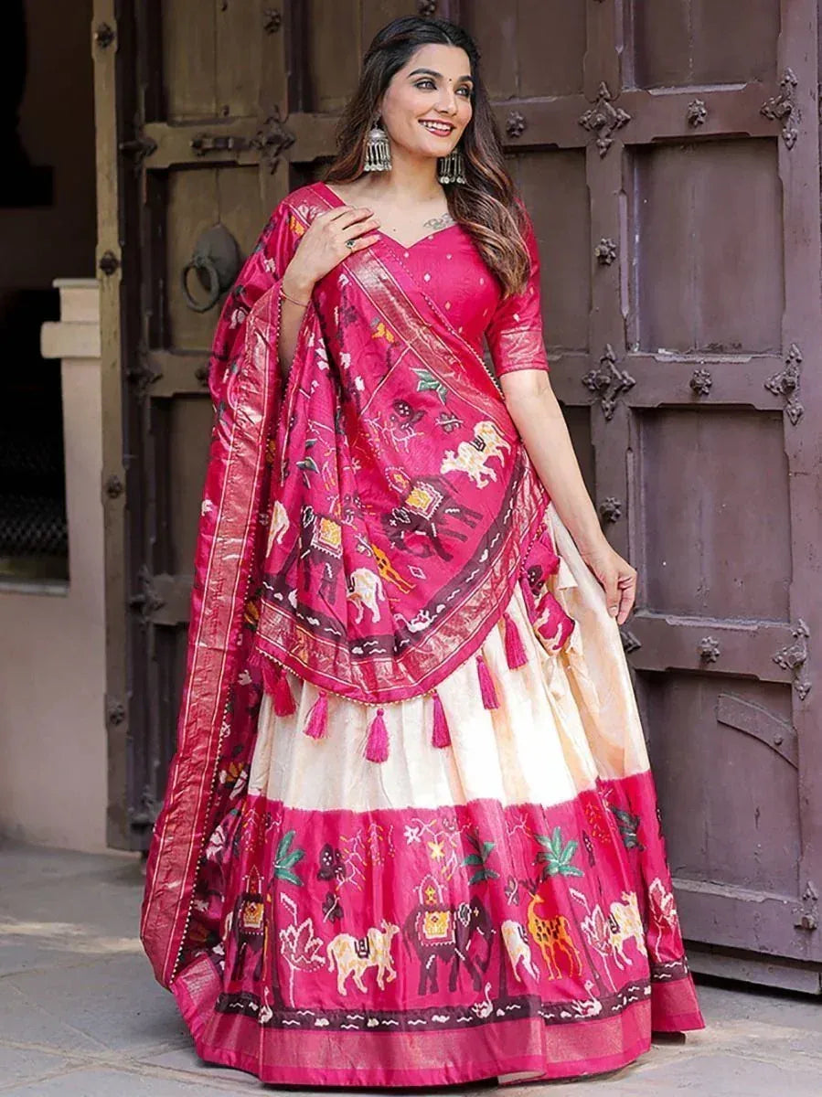 Pink and cream printed lehenga choli with elephant motifs, perfect for Indian ethnic wear occasions