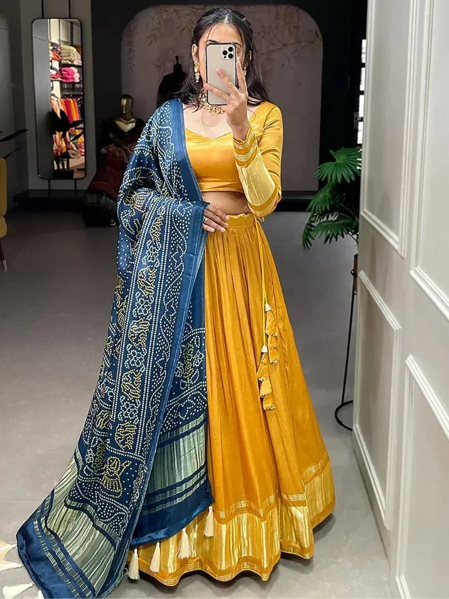 Yellow velvet lehenga choli with blue embroidered dupatta, Indian ethnic wear for women