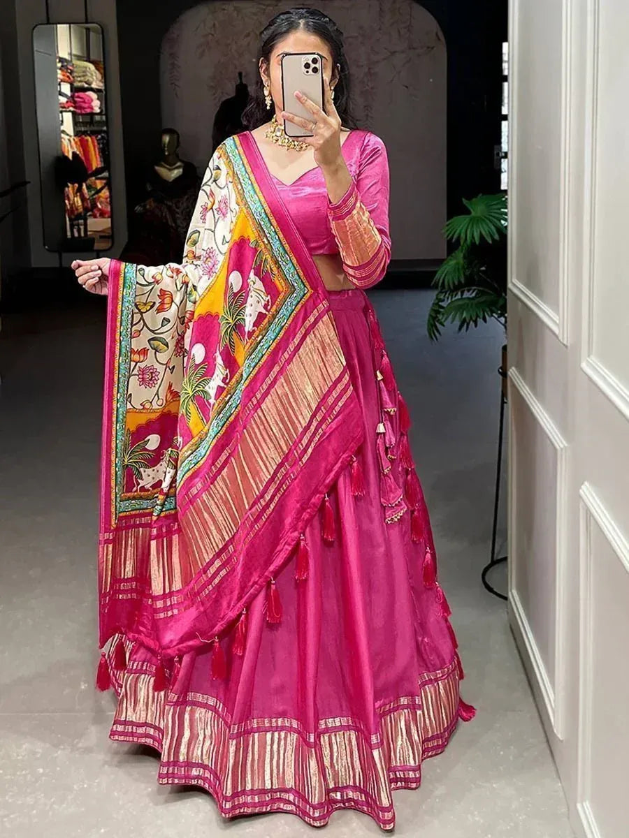 Vibrant pink lehenga choli with printed dupatta, ethnic Indian wear for women