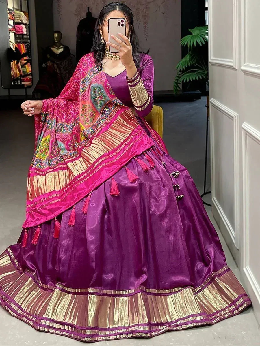 Purple designer lehenga choli with pink embroidered dupatta, ethnic Indian wear for weddings and festivals